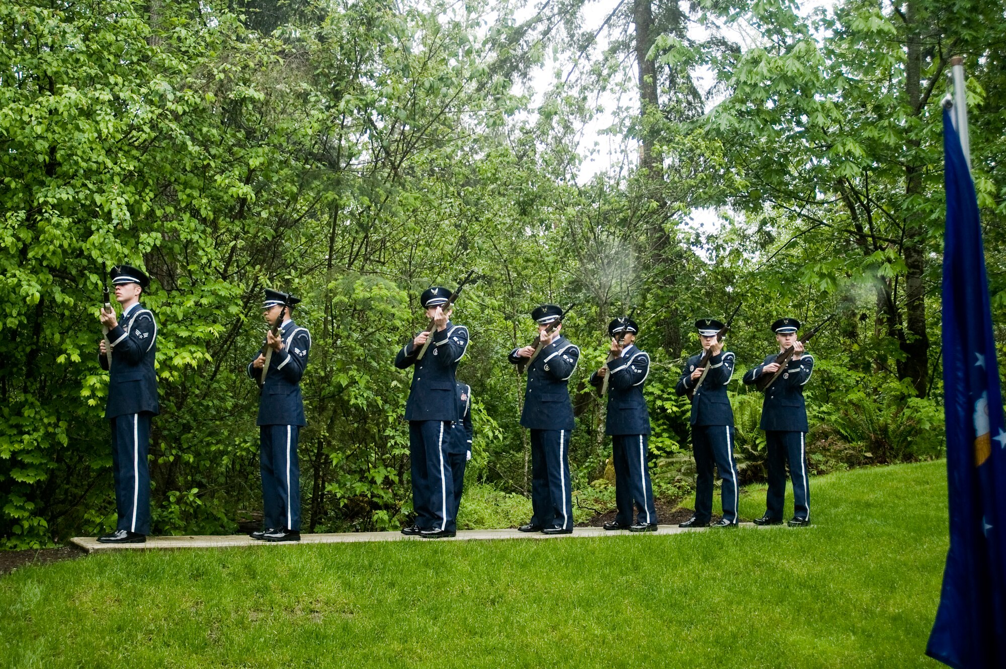 The McChord Field Base Honor Guard renders a ceremonial rifle-volley during a funeral service at Tahoma National Cemetery May 28. (U.S. Air Force Photo/Abner Guzman)