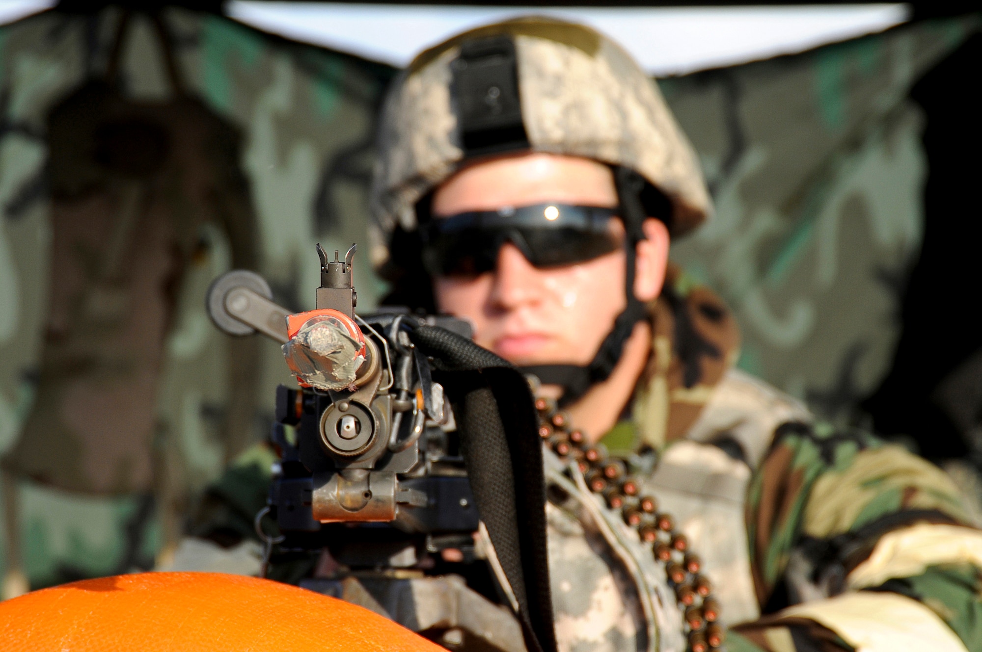 Senior Airman Robert Amburgey provides watch over the main gate at the Gulfport Combat Readiness Training Center during an operational readiness inspection May 20, 2010, in Gulfport, Miss. Airman Amburgey is with the 123rd Airlift Wing's security forces squadron. (U.S. Air Force photo/Tech. Sgt. Dennis Flora)