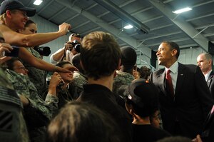 JOINT BASE ANDREWS, Md. -- President Barack Obama shakes hands with troops
and family members after his Memorial Day speech inside the Tactical Fitness
Center here May 31, 2010. The President's speech was originally scheduled to take place at the Abraham Lincoln National Cemetery in Elwood, Ill., but was moved to Andrews due to severe weather. (U.S. Air Force photo by Senior Airman Melissa V. Brownstein)
