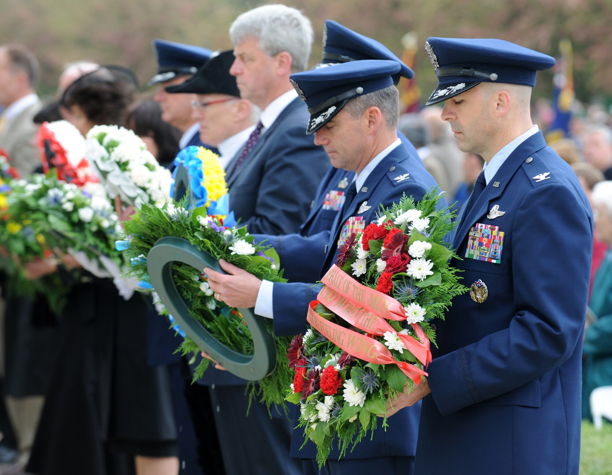 RAF MILDENHALL, England – Col. Chad Manske, 100th Air Refueling Wing commander, lays a wreath at the Wall of the Missing at Madingley Memorial Cemetery on Memorial Day May 31. The cemetery is the final resting place for thousands of American veterans. (U.S. Air Force photo/ Staff Sgt. Jerry Fleshman)