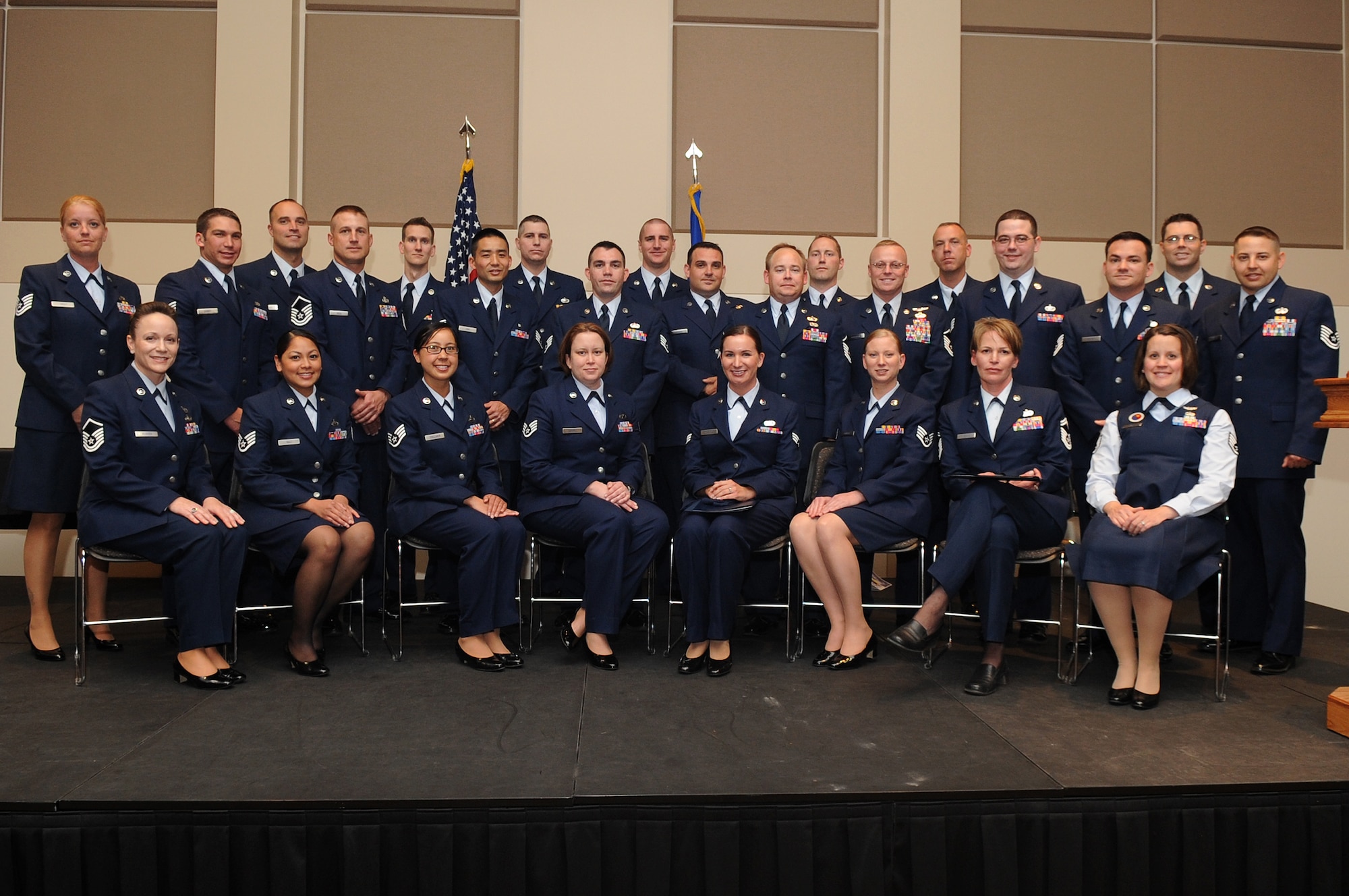 BUCKLEY AIR FORCE BASE, Colo. -- 27 Team Buckley Community College of the Air Force graduates celebrate May 27. (U.S. Air Force Photo by Airman 1st Class Manisha Vasquez)