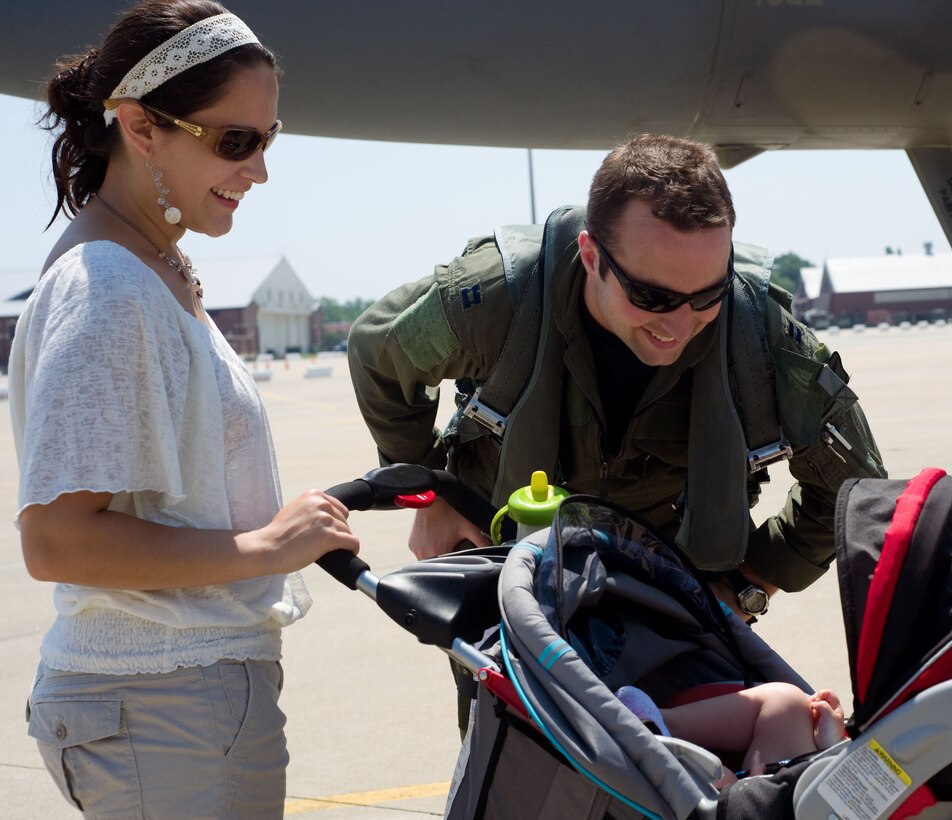 LANGLEY AIR FORCE BASE, Va. – Capt. Michael “Hijack” Fritts, 71st Fighter Squadron pilot, greets his wife Giselle and his daughter Natalie upon returning from a two-week temporary duty assignment to Tyndall Air Force Base, Fla., in support of a weapon system evaluation program May 27. The TDY was the last ever for the 71 FS as the unit will be deactivated this fall. The program is designed to evaluate pilots, aircraft and maintenance personnel in the area of ordnance employment. “Our maintenance support was the best I've ever seen in my 17 years of service,” said Lt. Col. Joel Cook, 71 FS commander. (U.S. Air Force photo/Staff Sgt. Barry Loo)