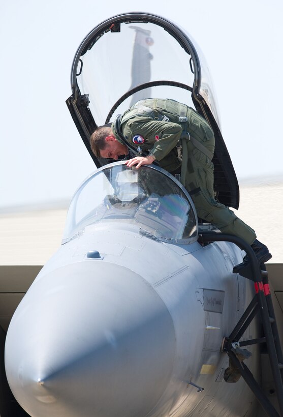 LANGLEY AIR FORCE BASE, Va. – Lt. Col. Joel Cook, 71st Fighter Squadron commander, returns from a two-week temporary duty assignment to Tyndall Air Force Base, Fla., in support of a weapon system evaluation program May 27. The TDY was the last ever for the 71 FS as the unit will be deactivated this fall. The program is designed to evaluate pilots, aircraft and maintenance personnel in the area of ordnance employment. “Our maintenance support was the best I've ever seen in my 17 years of service,” said Cook. (U.S. Air Force photo/Staff Sgt. Barry Loo)