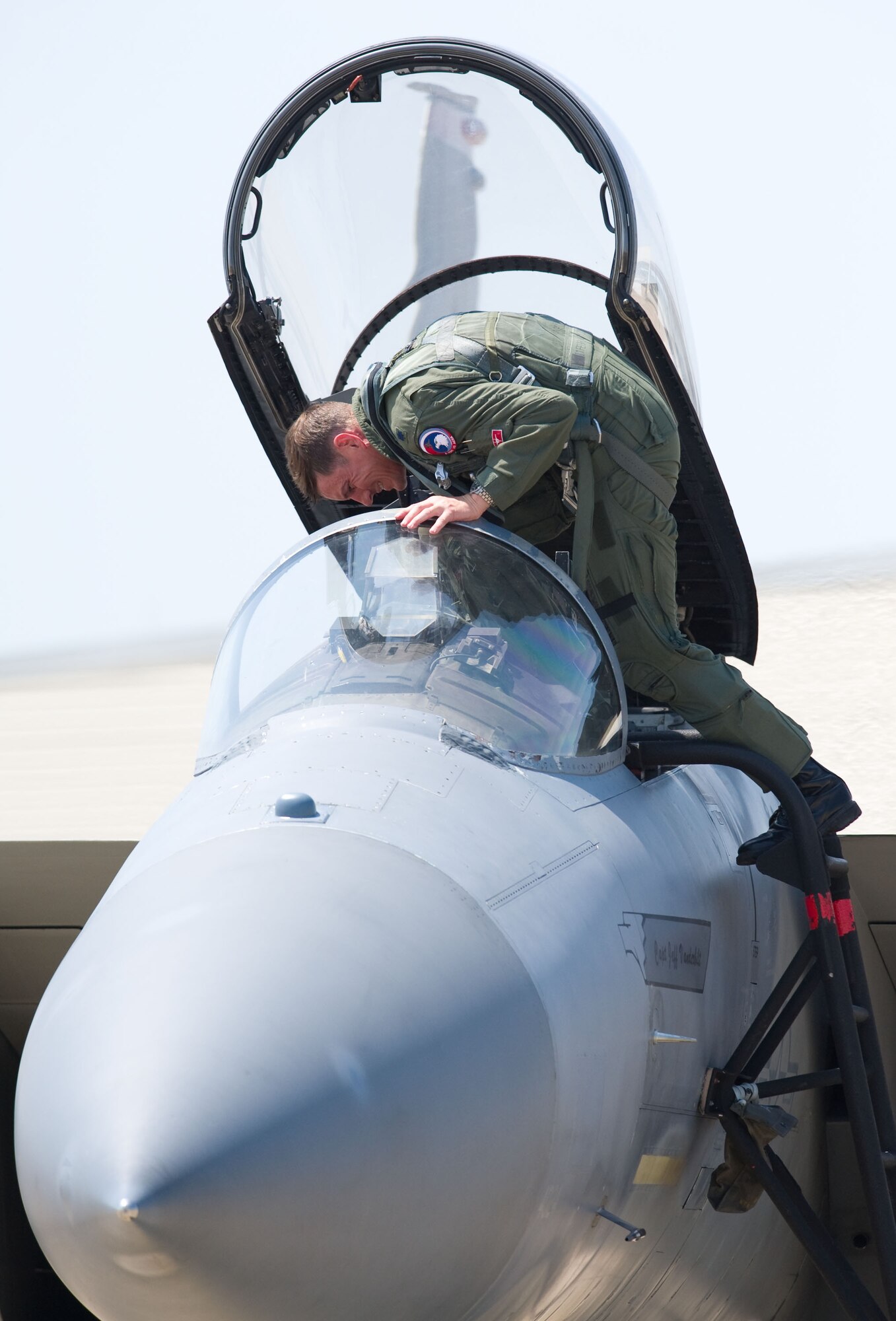 LANGLEY AIR FORCE BASE, Va. – Lt. Col. Joel Cook, 71st Fighter Squadron commander, returns from a two-week temporary duty assignment to Tyndall Air Force Base, Fla., in support of a weapon system evaluation program May 27. The TDY was the last ever for the 71 FS as the unit will be deactivated this fall. The program is designed to evaluate pilots, aircraft and maintenance personnel in the area of ordnance employment. “Our maintenance support was the best I've ever seen in my 17 years of service,” said Cook. (U.S. Air Force photo/Staff Sgt. Barry Loo)