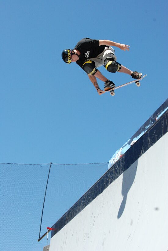 JOINT BASE ANDREWS, Md. -- Anthony Furlong, a team skateboarder for ASA Entertainment, performs an aerial maneuver at the Joint Service Open House here May 15. Mr. Furlong joins other extreme athletes in supporting the Air Force Reserve recruiting campaign, "Grab Some Air," which aims at attracting an active demographic of 17 to 34-year-olds to the Reserve. The JSOH allows members of the public an excellent opportunity to meet and interact with the men and women of the Armed Forces and to show them America’s skilled military. (U.S. Air Force photo/Capt. Rebecca Garcia) 

