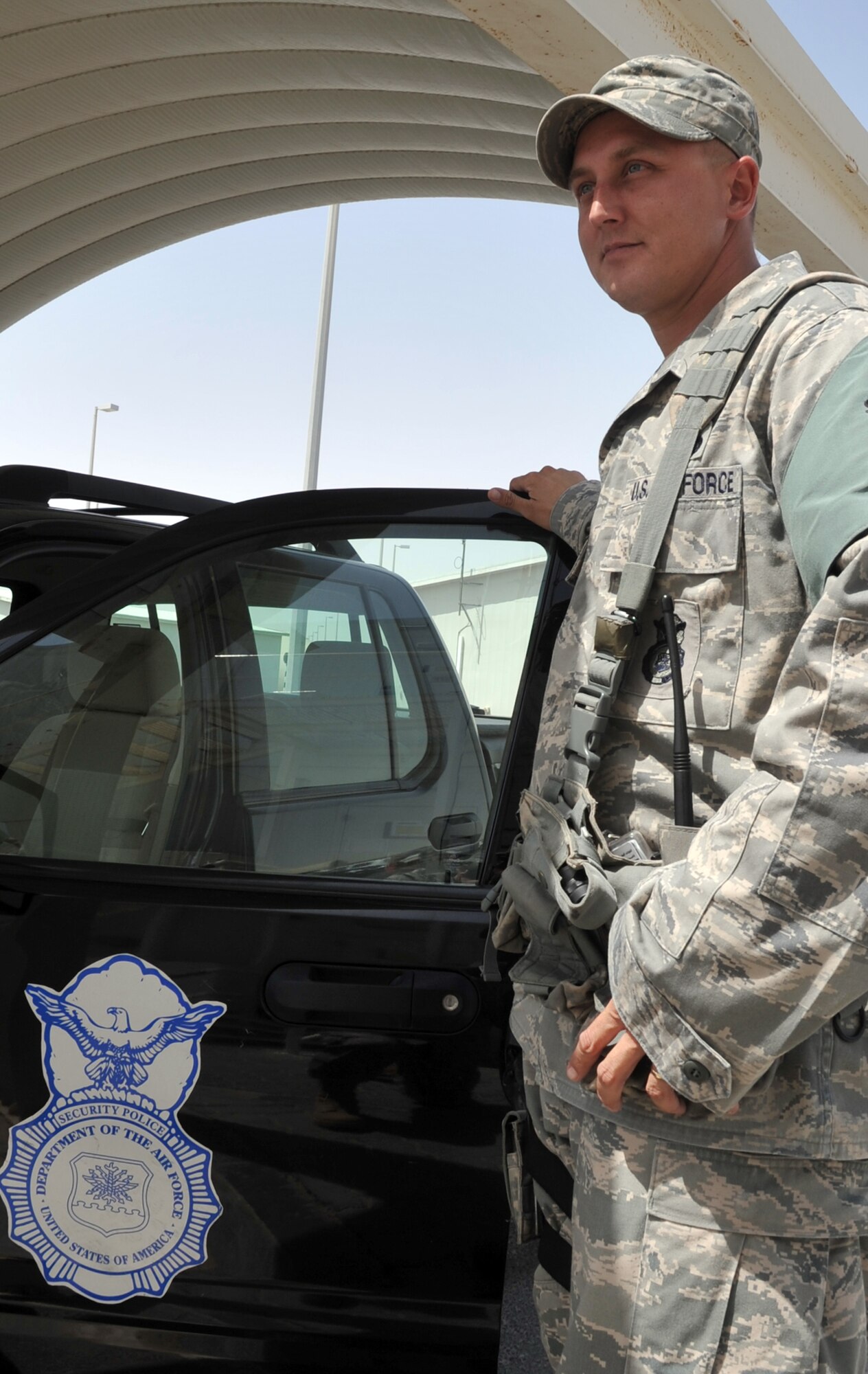 Tech. Sgt. Matthew Hoffman, a security forces craftsman with the 380th Expeditionary Security Forces Squadron, works at his unit during operations for the 380th Air Expeditionary Wing at a non-disclosed base in Southwest Asia on May 29, 2010. Sergeant Hoffman is deployed from the 96th Security Forces Squadron at Eglin Air Force Base, Fla., and his hometown Manitowoc, Wisc. (U.S. Air Force Photo/Master Sgt. Scott T. Sturkol/Released)