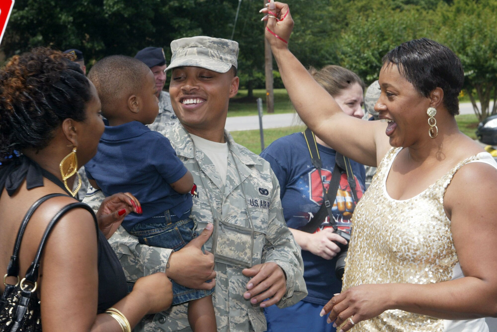 Family and friends turn out for the welcome home of Staff Sgt. Branden L. Johnson of the 94th Security Forces Squadron. He and twelve other security forces members are greeted here in an emotional reunion Memorial Day, May 31 as they return from their recent deployment to Iraq. (U.S. Air Force photo/Don Peek)