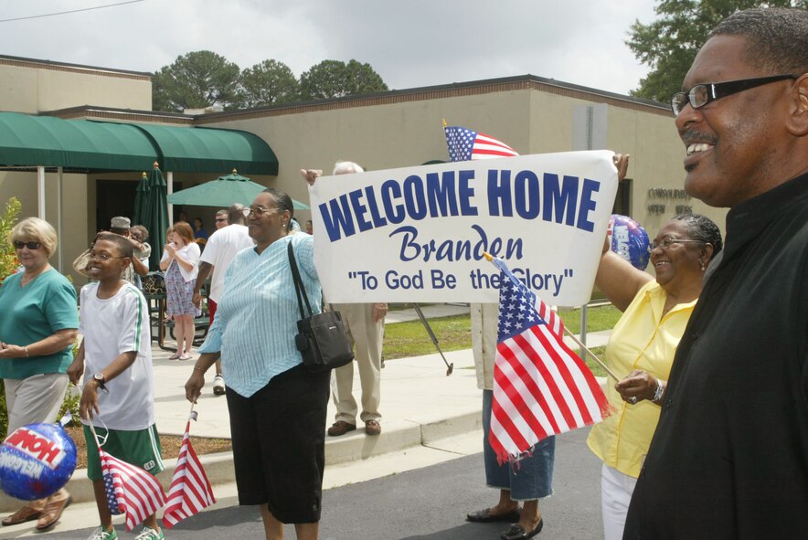 Family and friends turn out for the welcome home of Staff Sgt. Branden L. Johnson of the 94th Security Forces Squadron. He and twelve other security forces members are greeted here in an emotional reunion Memorial Day, May 31 as they return from their recent deployment to Iraq. (U.S. Air Force photo/Don Peek)