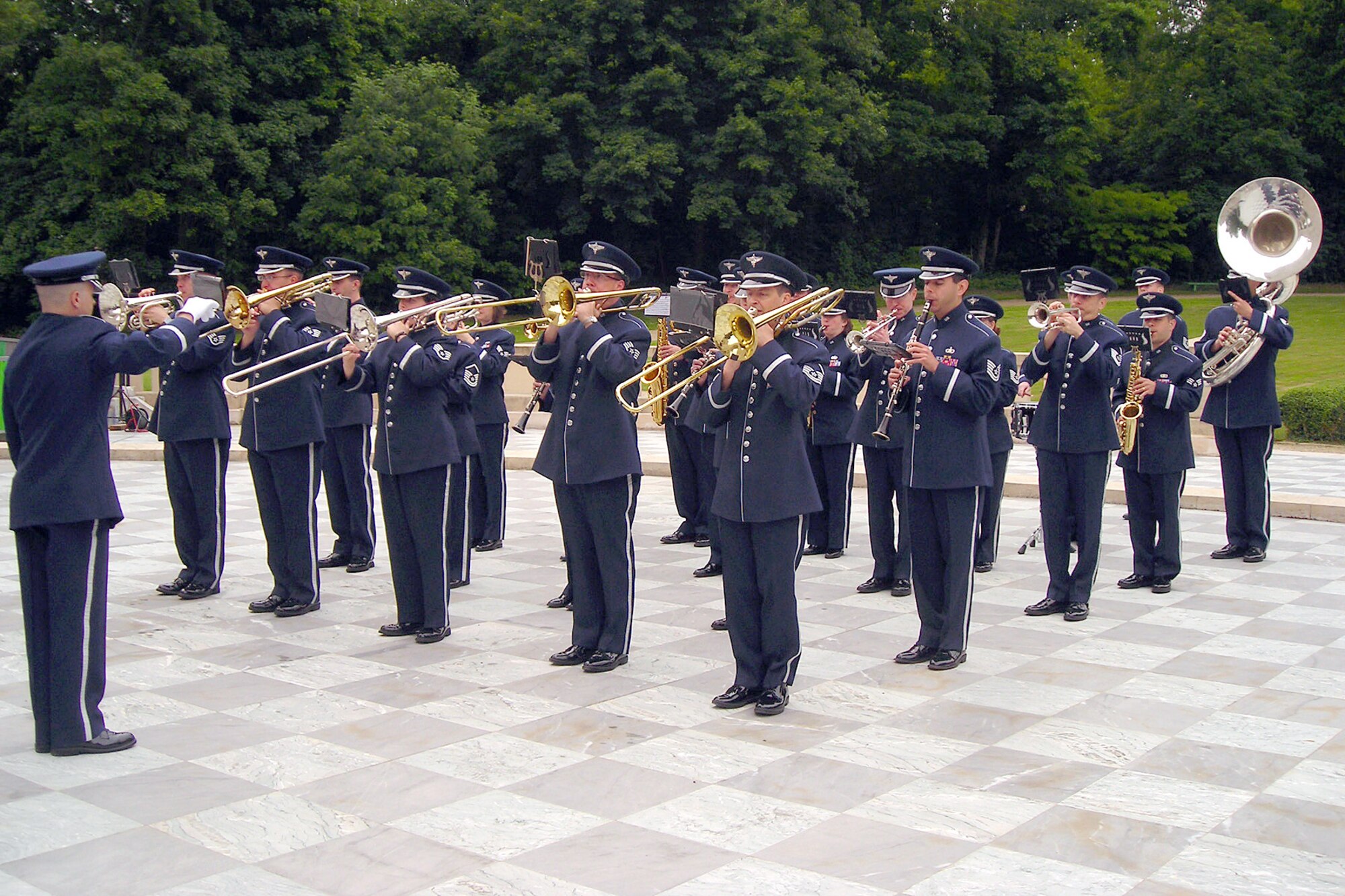 PARIS - The U.S. Air Forces in Europe band performs at the Lafayette Escadrille Memorial outside of Paris honoring American pilots who died during World War I, May 27, 2010. U.S. and French civilian and military leaders paid their respects to America’s first combat pilots during the ceremony, which also featured aircraft flyovers and ceremonial music. The Lafayette Escadrille Memorial is a reminder to all of the American pilots of the Escadrille La Fayette and the Lafayette Flying Corps who died during service to the Allies. (U.S. Air Force photo/Capt. Tony Wickman)