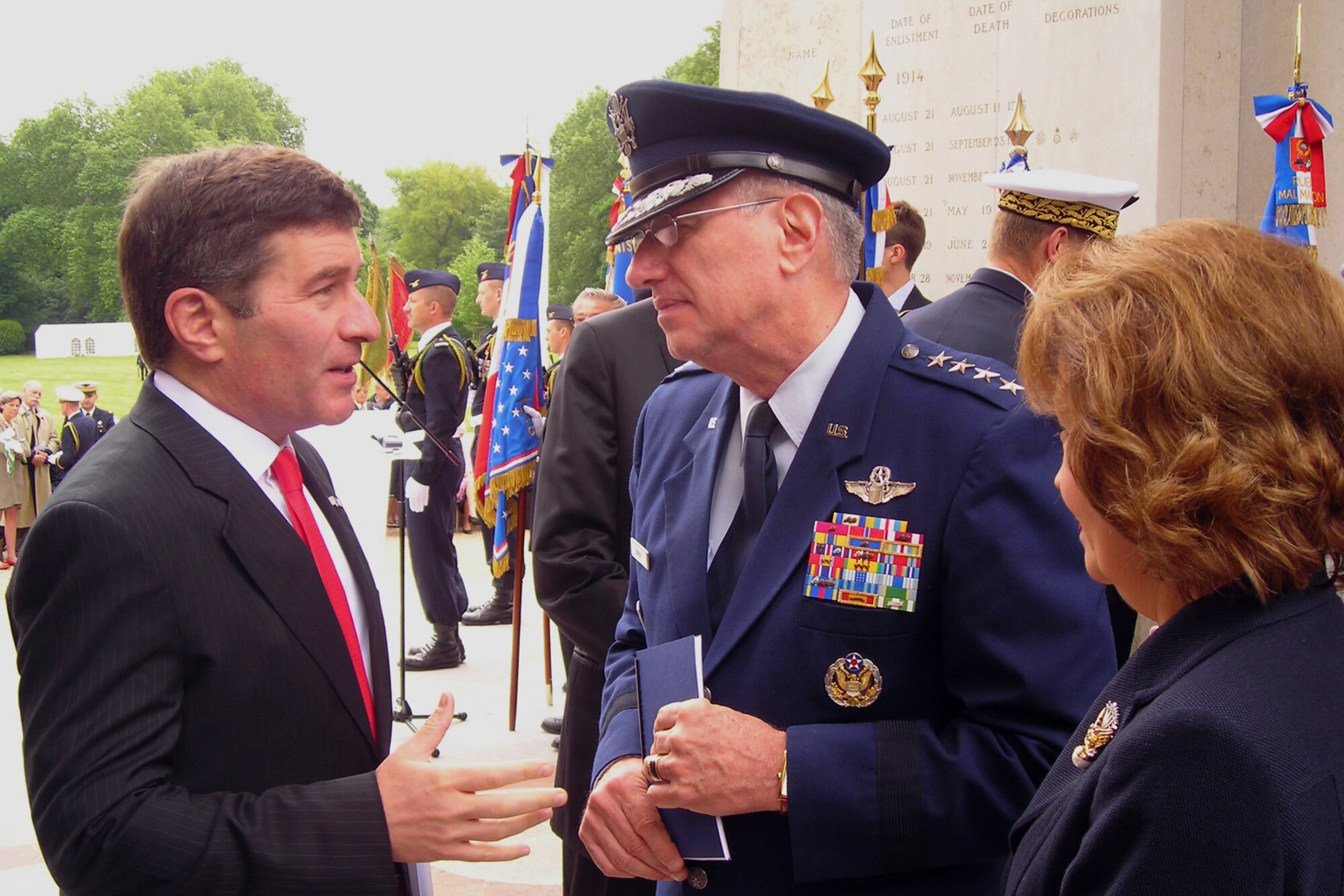 PARIS - U.S. Ambassador to France Charles Rivkin speaks with Gen. Roger Brady, U.S. Air Forces in Europe commander, before the start of a dignified ceremony at the Lafayette Escadrille Memorial outside of Paris, May 27, 2010. U.S. and French civilian and military leaders paid their respects to America's first combat pilots during the event, which also featured an aircraft flyover and ceremonial music. The Lafayette Escadrille Memorial is a reminder for all of the American pilots of the Escadrille La Fayette and the Lafayette Flying Corps who died during service to the Allies during World War I. (U.S. Air Force photo/Capt. Tony Wickman)