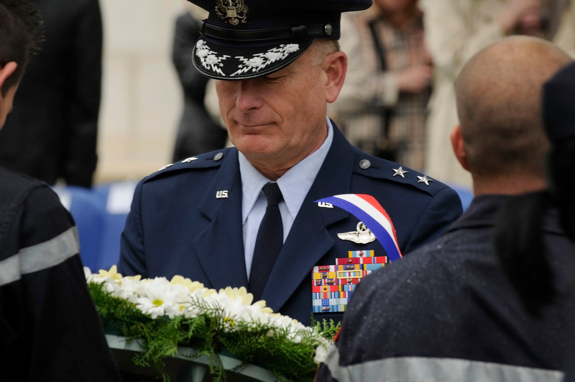 U.S. Air Force Maj. Gen. Jack Egginton, Director Air and Space Operation, USAF, Germany, participates in a wreath offering during the Memorial Day ceremony, Thiaucourt, France, May 30, 2010. U.S. Memorial Day, originally called Decoration Day, is a day of remembrance for those who have died in our nation's service. (U.S. Air Force photo by Airman 1st Class Desiree Esposito)