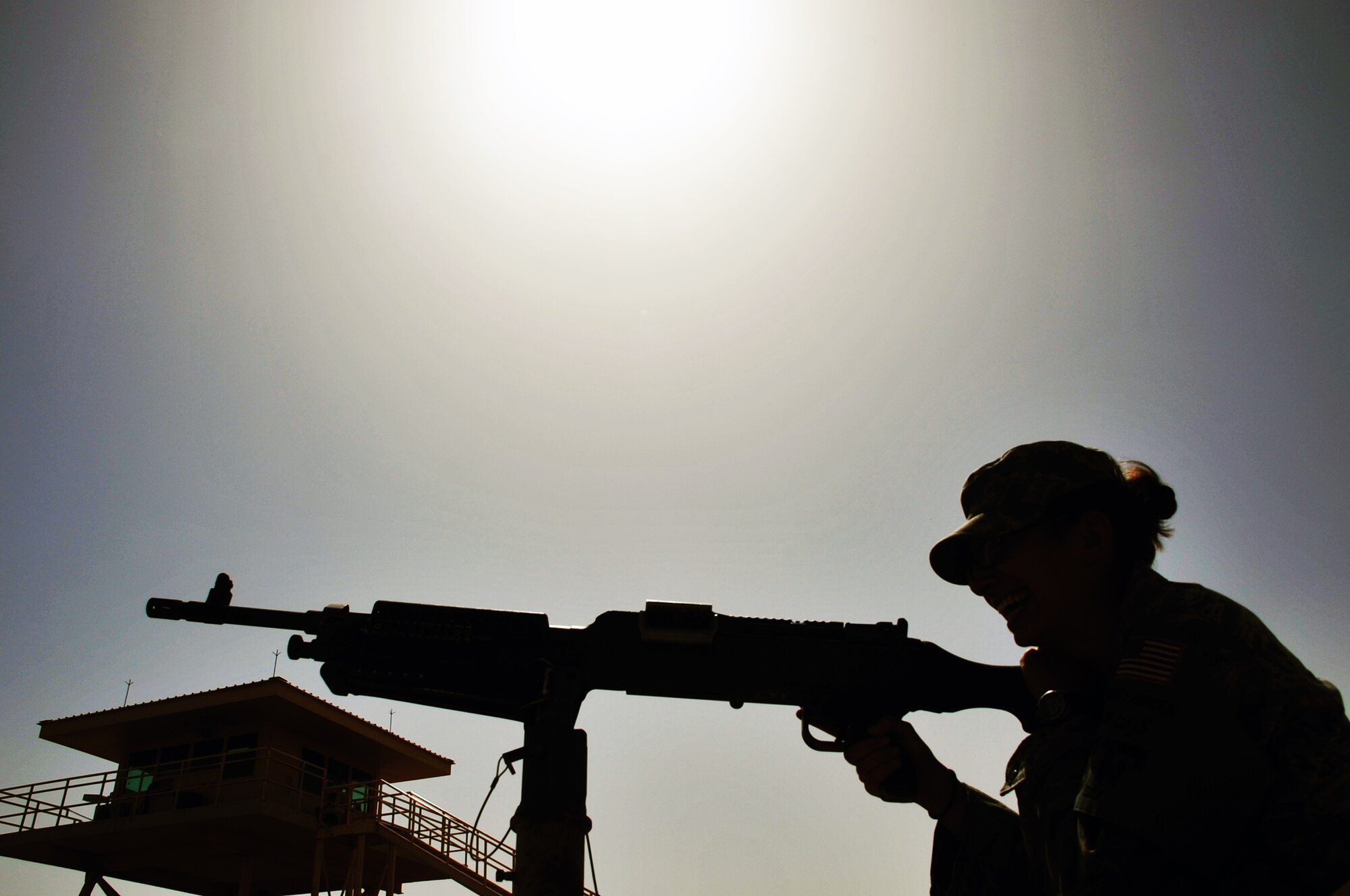 A security forces Airman from the 380th Expeditionary Security Forces Squadron makes adjustments to a machine gun mounted on a tactical vehicle during operations for the 380th Air Expeditionary Wing at a non-disclosed base in Southwest Asia. The 380th ESFS provides all security and force protection for a deployed wing, the 380th AEW, of more than 1,900 people and for billions of dollars worth of Air Force equipment and assets. Also the 380th ESFS, as part of the 380th AEW, supports operations Iraqi Freedom and Enduring Freedom and the Combined Joint Task Force-Horn of Africa. The wing is home to the KC-10 Extender, U-2 Dragon Lady, E-3 Sentry and RQ-4 Global Hawk aircraft. The wing is comprised of four groups and 12 squadrons and the wing's deployed mission includes air refueling, air battle management, intelligence, surveillance and reconnaissance in support of overseas contingency operations in Southwest Asia. (U.S. Air Force Photo/Master Sgt. Scott T. Sturkol/Released)
