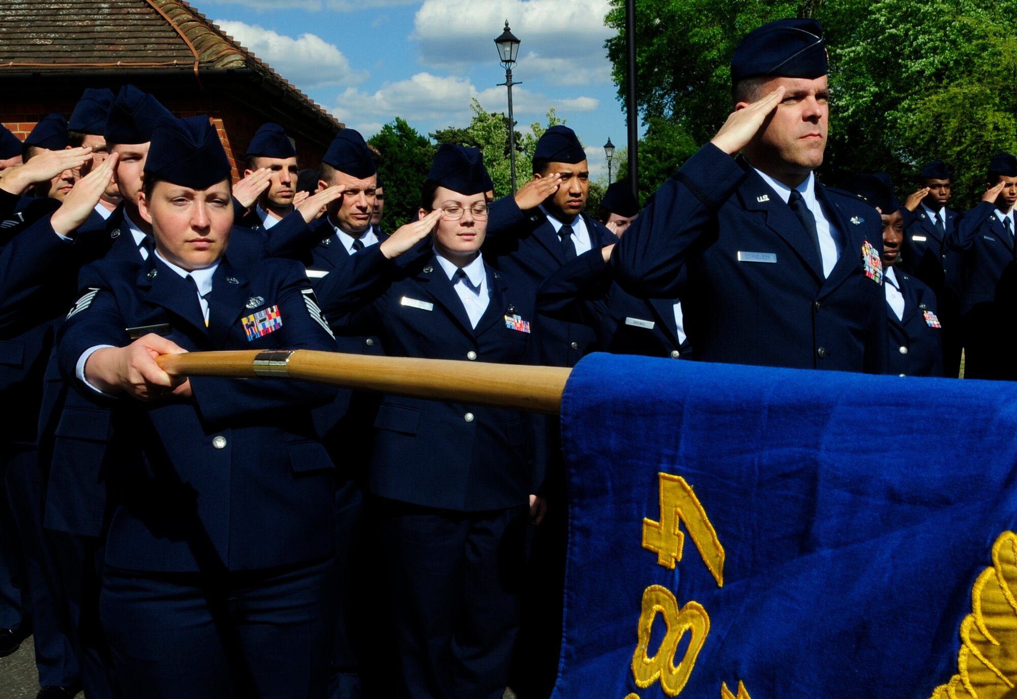RAF MILDENHALL, England – The 488th Intelligence Squadron salutes the flag during Retreat May 28.  The ceremony pays honor to the flag as well as signifying the end of the duty day.  (U.S. Air Force photo/Staff Sgt. Christopher L. Ingersoll)