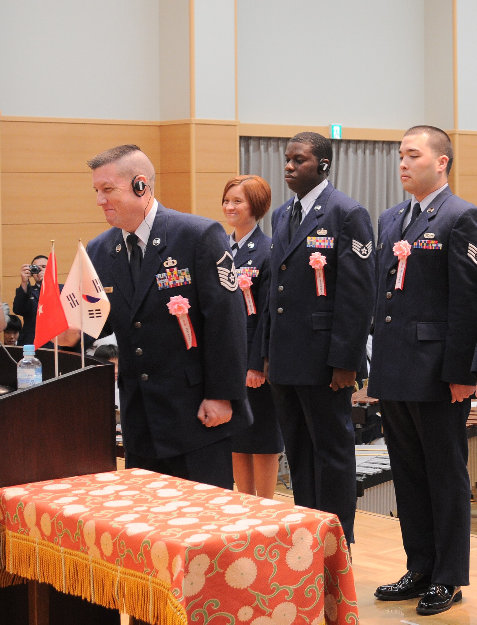 YOKOTA AIR BASE, Japan -- Airmen from Yokota Air Base accept an award from the Good Conduct Association of Japan, or Nippon Zenkokai, May 22 during a ceremony at Meiji Shrine in Tokyo. (U.S. Air Force photo/Katrina R. Menchaca)