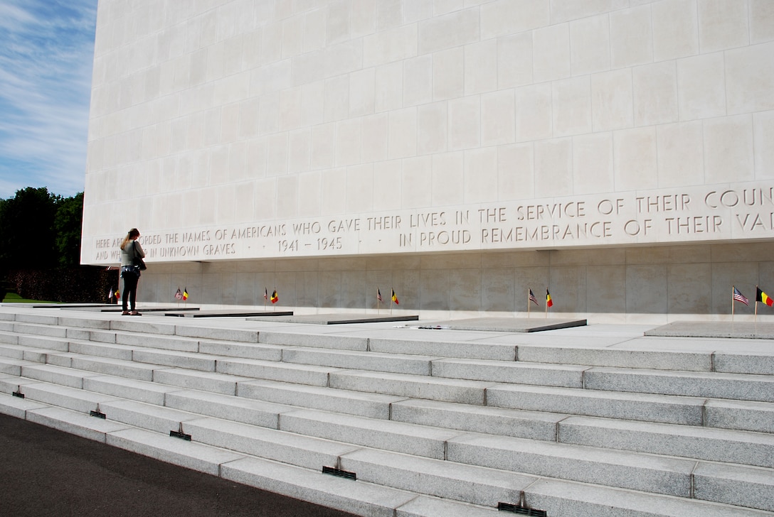 A visitor pays respects to the WWII dead at Ardennes American Cemetery and Memorial in Belgium, May 29, 2010. A total of 5,329 U.S. soldiers are buried at the cemetery.