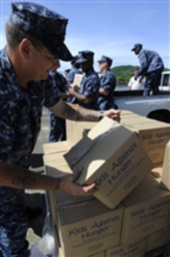 U.S. Navy Petty Officer 2nd Class Howard Leroy helps fellow sailors from High Speed Vessel Swift (HSV 2) load Project Handclasp donations into vehicles in Rodman-Balboa, Panama, on May 26, 2010.  The donations were transported to several organizations in Panama City, Panama.  The Swift was deployed to Panama in support of Southern Partnership Station 2010.  Southern Partnership Station is an annual deployment of various specialty platforms to the U.S. Southern Command area of responsibility in the Caribbean and Latin America.  The mission's primary goal is information sharing with navies, coast guards and civilian services throughout the region.  