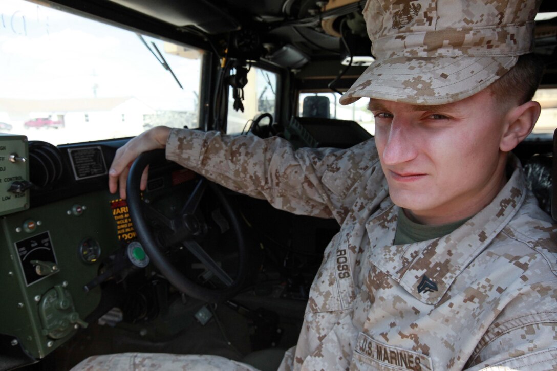 Corporal Tim D. Ross, a motor transportation operator with Training and Operations office, 2nd Marine Division, makes sure humvees are serviceable for future licensing operations, April 11. Ross, a Forest Grove, Ore., native, has deployed to Afghanistan as a motor transport operator and currently trains Marines how to operate various vehicles including the humvee. Ross explained witnessing the attacks on Sept. 11, 2001 was a major reason why he joined the Marine Corps.
