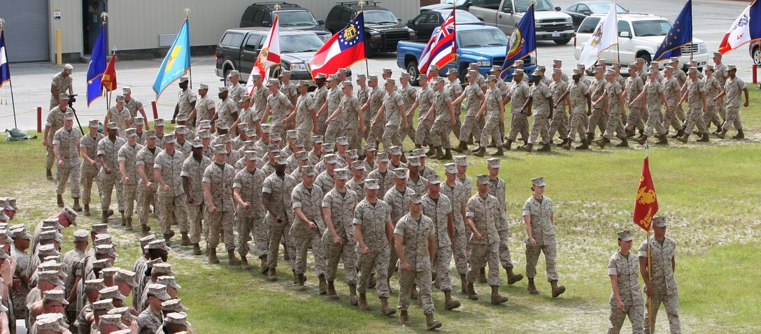 Platoons pass in review at the end of the change of command ceremony for 2nd Maintenance Battalion, Combat Logistics Regiment 25, 2nd Marine Logistics Group, aboard Camp Lejeune, N.C., June 2, 2010.  Lt. Col. David P. Grant, the outgoing commanding officer for 2nd Maint. Bn. from June 2008 through June 2010, was relieved by Lt. Col. Kevin R. Scott.