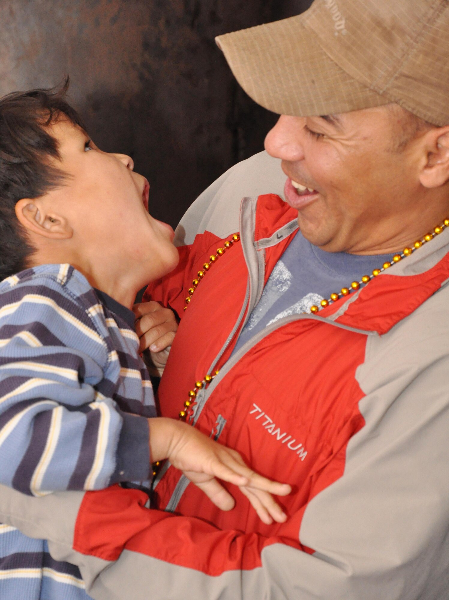 Master Sgt. Jerry Molina, an Airman from the Transit Center at Manas, Kyrgyzstan, plays with a child at Nadjeshda Orphanage during a humanitarian assistance visit June 2, 2010. U.S. Airmen have supported Nadjeshda for the last six years, helping rebuild and repair the facility and spending time with the children. (U.S. Air Force photo/Staff Sgt. Carolyn Viss)