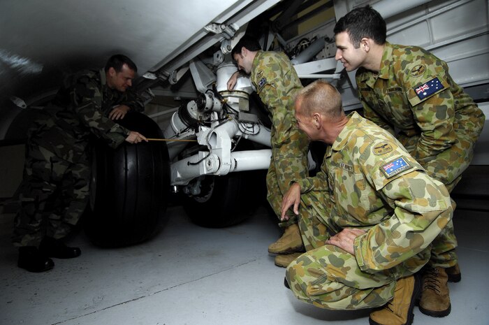 U.S. Air Force Tech. Sgt. Bryan Doughty instructs Royal Australian Airmen during a three month course on C-17 maintenance at Joint Base Charleston, S.C., June 1, 2010. For many of the Australian Airmen, it is their first time to the United States and they have completed one month of training. Sergeant Doughty is a training instructor with the 373rd Training Squadron, Detachment 5. (U.S. Air Force/Airman 1st Class Lauren Main)