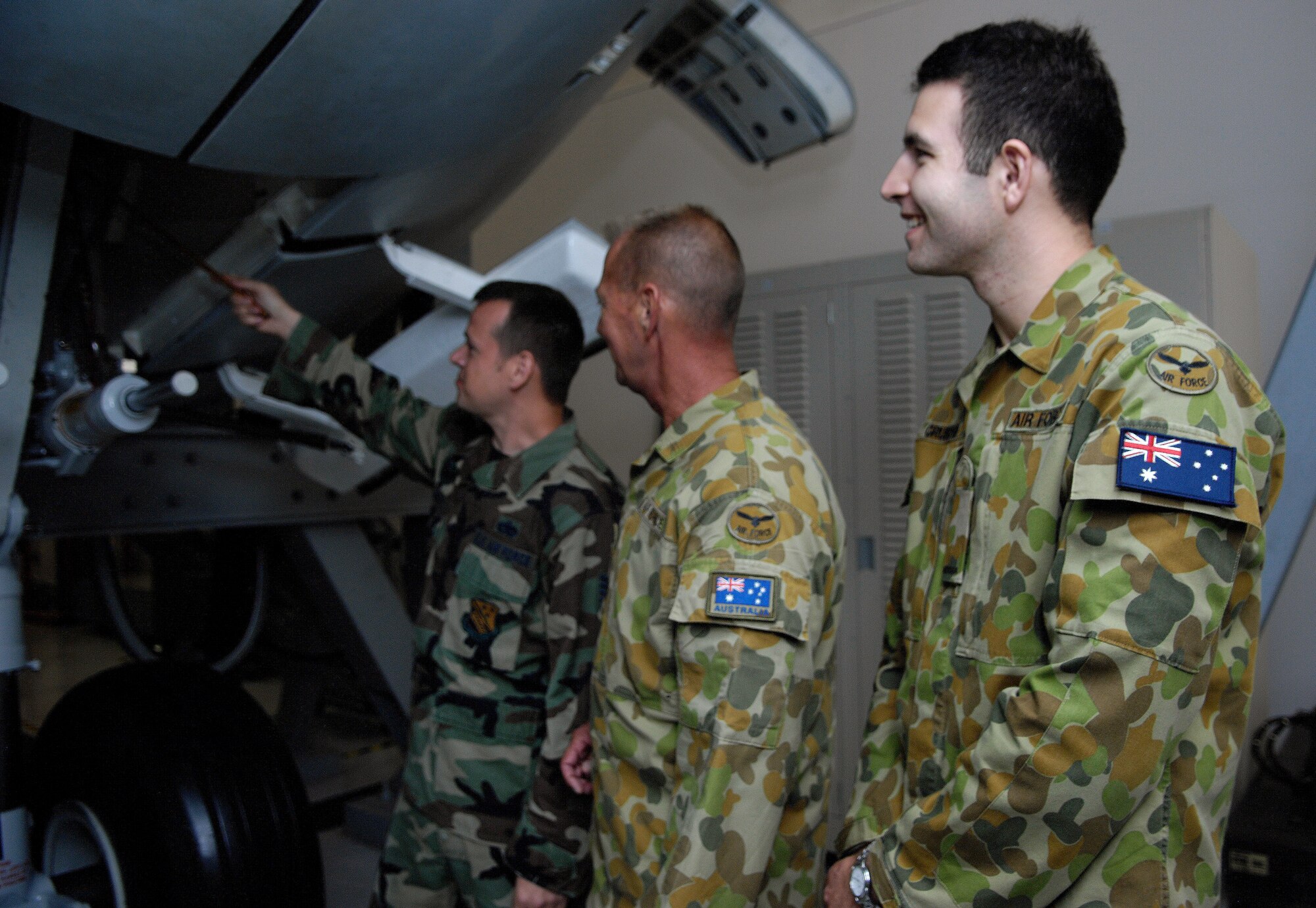 U.S. Air Force Tech. Sgt. Bryan Doughty instructs Royal Australian Airmen during a three month course on C-17 maintenance at Joint Base Charleston, S.C., June 1, 2010. In addition to the Royal Australian Air Force, the 373rd Training Squadron, Detachment 5 has also hosted and trained other international military members such as those from Canada, Qatar, the United Kingdom and Hungary. Sergeant Doughty is a training instructor with the 373 TRS. (U.S. Air Force/Airman 1st Class Lauren Main)