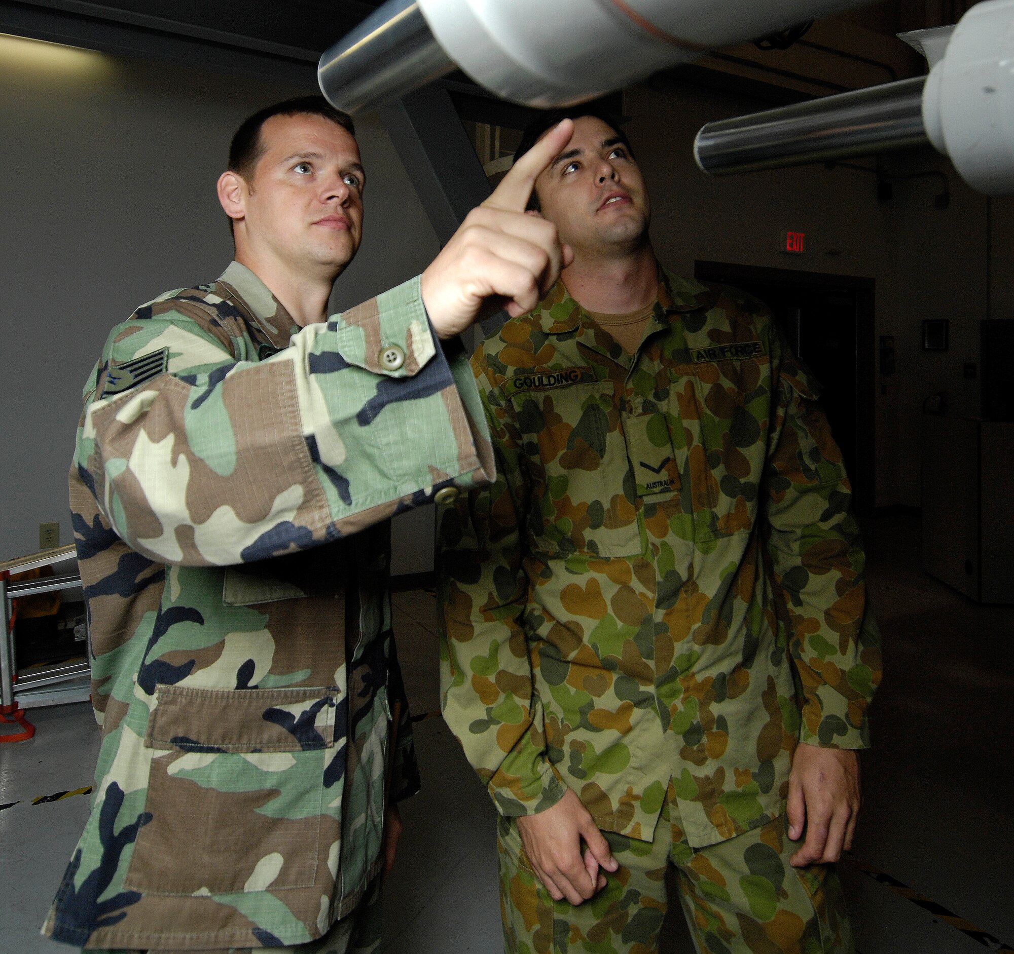 U.S. Air Force Tech. Sgt. Bryan Doughty instructs a Royal Australian Airman during a three month course on C-17 maintenance at Joint Base Charleston, S.C., June 1, 2010. There are currently 12 Australian Airmen training at the 373rd Training Squadron, Detachment 5 who all hail from Queensland, Australia. The Royal Australian Air Force currently owns and operates four C-17s which are maintained by a squadron of roughly 200 Airmen. Sergeant Doughty is a training instructor with the 373 TRS. (U.S. Air Force/Airman 1st Class Lauren Main)