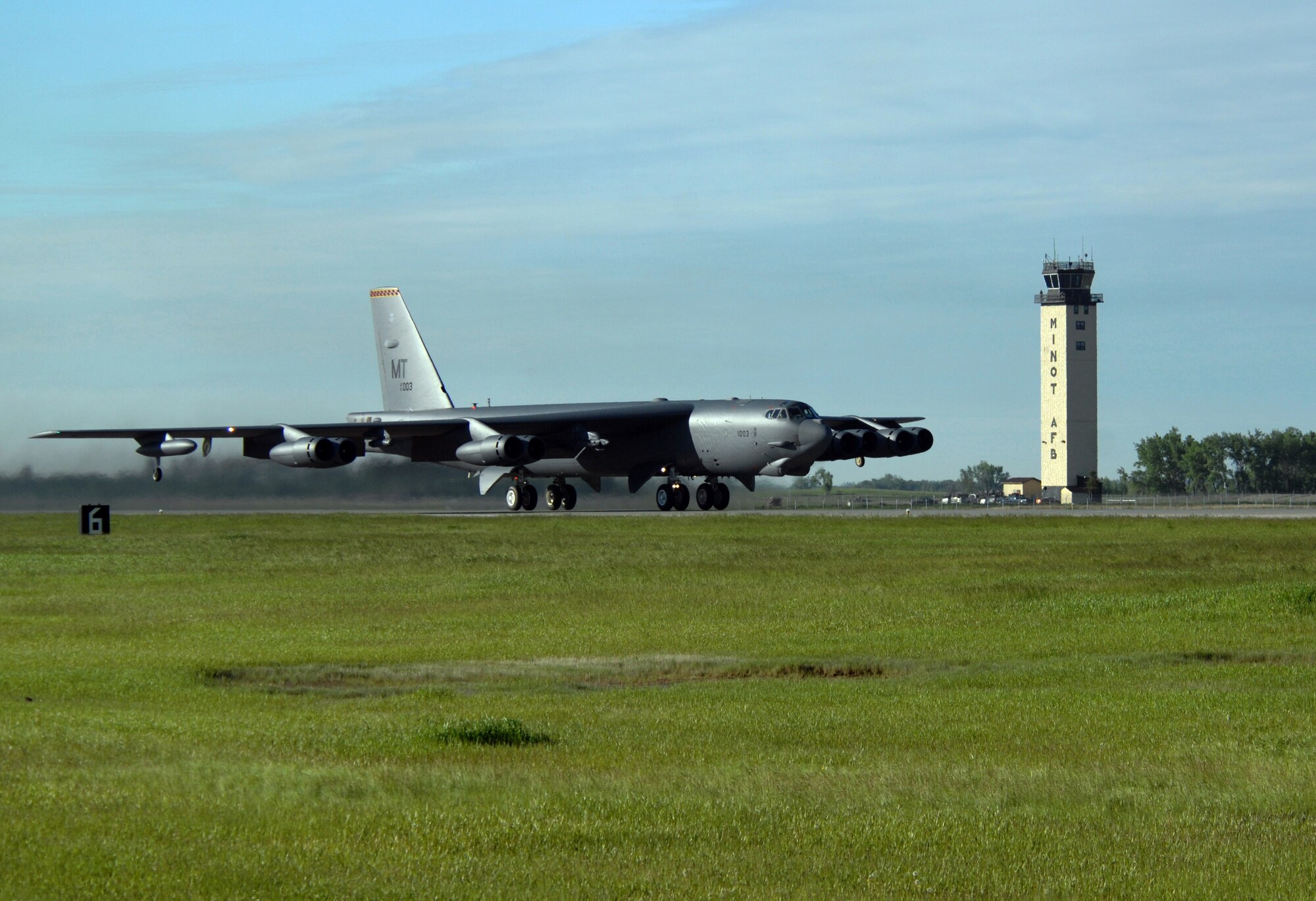 MINOT AIR FORCE BASE, N.D. -- A B-52H Stratofortess takes off on its way to Andersen AFB, Guam, as part of a deployment here June 2. During the six-month deployment, nearly 350 Airmen and several B-52s will provide U.S. Pacific Command with a continuous bomber presence in the Asia-Pacific region. (U.S. Air Force photo by Senior Airman Michael J. Veloz)