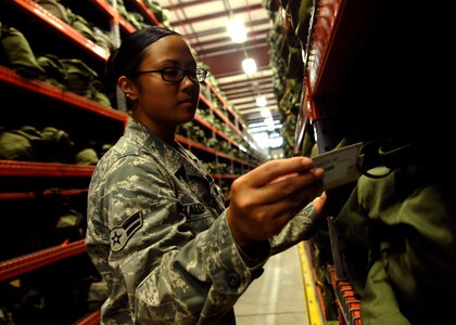 Airman 1st Class Tiani Talledo inventories mobility bags at the 628th Logistics Readiness Squadron warehouse June 2, 2010, at Joint Base Charleston, S.C. Once a week, the 628 LRS holds a mobility line to gear up Airmen for upcoming deployments and temporary duty assignments, making accurate inventories of supplies an essential part of equipping Charleston Airmen. Airmen Talledo is an individual protective equipment apprentice with the 628 LRS. (U.S. Air Force photo/Senior Airman Timothy Taylor)