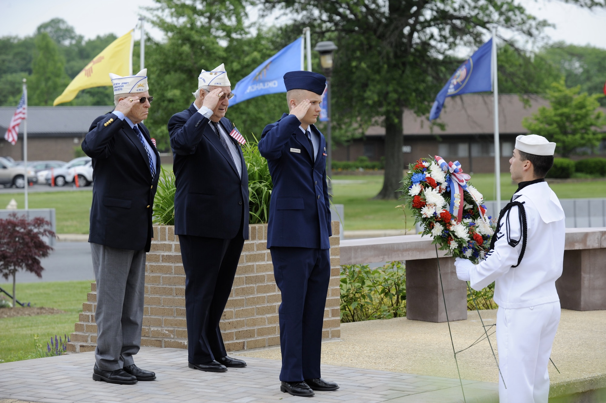 Participants in the Parade of Wreaths ceremony laid more than 40 wreaths in tribute to those who gave their lives in service to this country. Servicemembers from all branches of the armed forces, retirees, community members and local police officers participated in the wreath laying. (U.S. Air Force photo/Carlos Cintron)