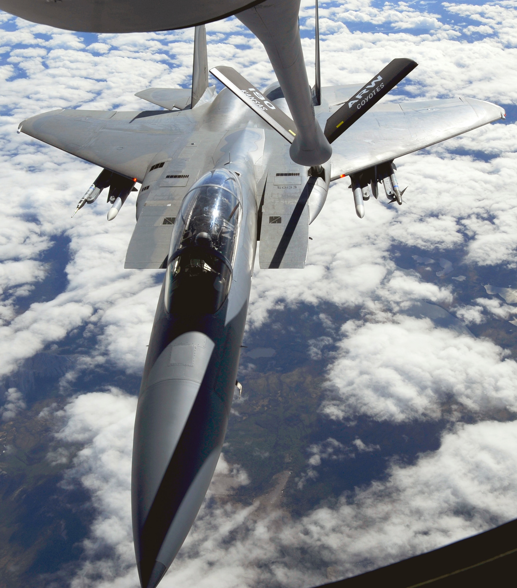 An F-15 Eagle from Elmendorf Air Force Base, Alaska, receives fuel from a KC-135 Stratotanker from Kansas Air National Guard's 190th Air Refueling Wing. The refueling took place over Alaska May 26, 2010.  (U.S. Air Force photo/Staff Sgt. Brian Ferguson)
