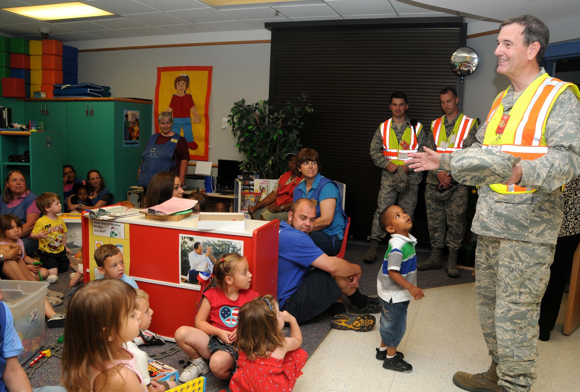 ALTUS AIR FORCE BASE, Okla. -- General Stephen Lorenz, Commander of Air Education and Training Command, visits the Child Development Center during the force protection exercise June 1. The purpose of the General’s visit to the CDC was to explain to the staff and kids why the base was conducting the exercise. (U.S. Air Force photo / Senior Airman Cherice Bryant / Released / 97th Air Mobility Wing Public Affairs)
