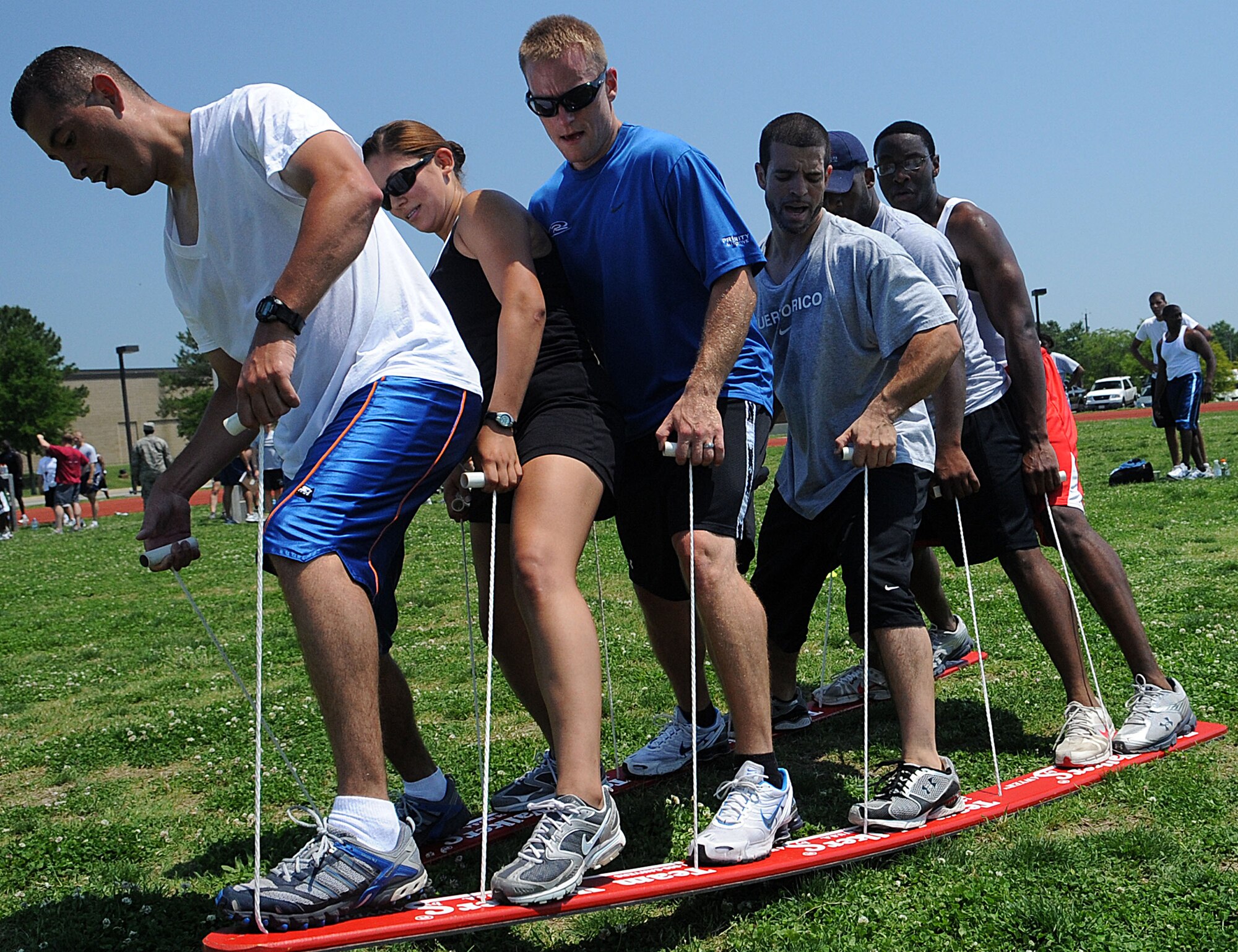 LANGLEY AIR FORCE BASE, Va. -- The 633d Force Support Squadron team participates in the Squadron Fitness Challenge hosted by 633d Force Support Squadron and Prism Sports May 27.  Eighteen teams participated in the annual event wrapping up May fitness month to promote a healthy, active lifestyle.  (U.S. Air Force Photo/Staff Sgt. Christina M. Styer)