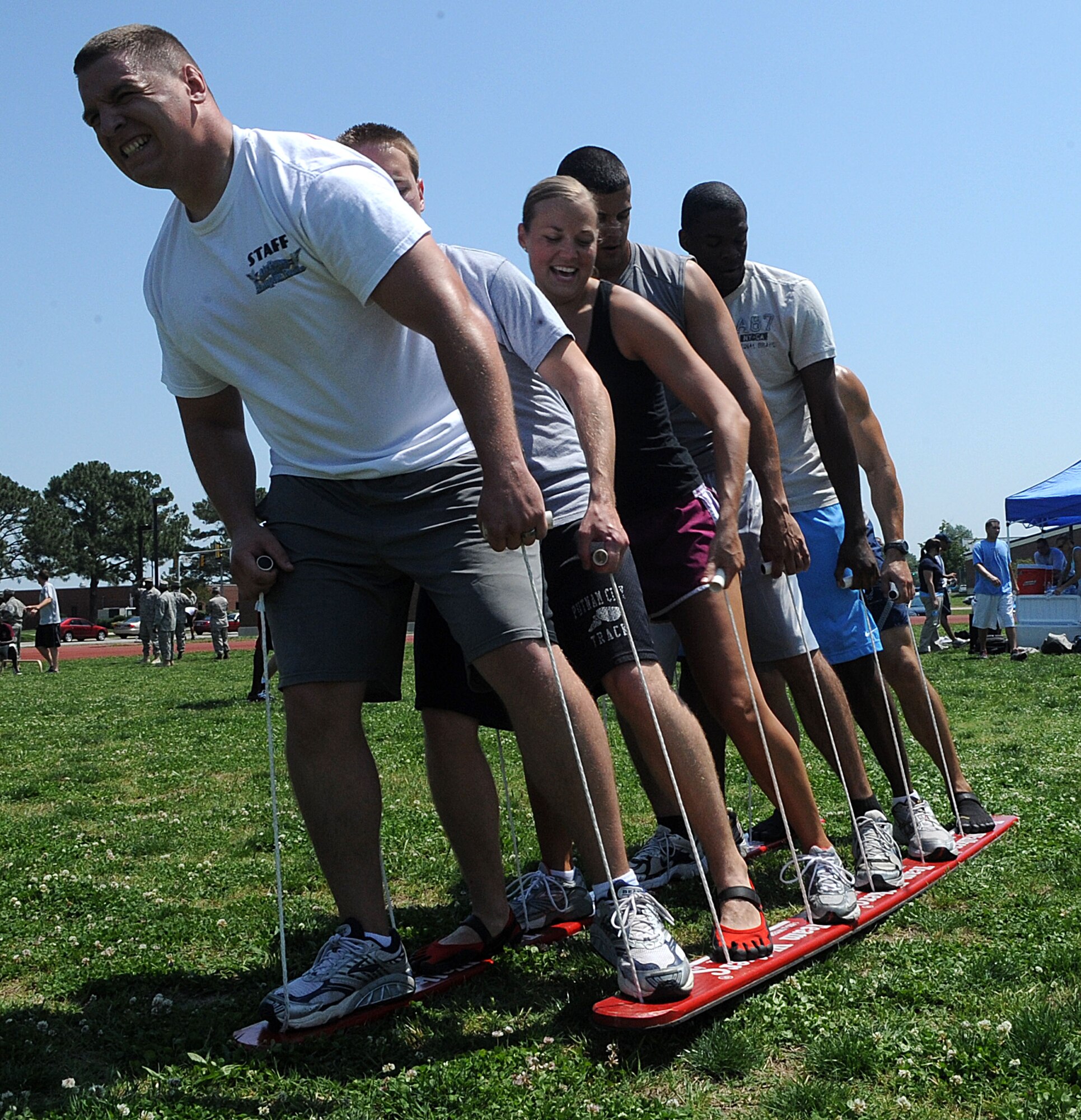 LANGLEY AIR FORCE BASE, Va. -- The 633d Contracting Squadron team participate in the Squadron Fitness Challenge hosted by 633d Force Support Squadron and Prism Sports May 27.  Eighteen teams participated in the annual event wrapping up May fitness month to promote a healthy, active lifestyle.  (U.S. Air Force Photo/Staff Sgt. Christina M. Styer)    