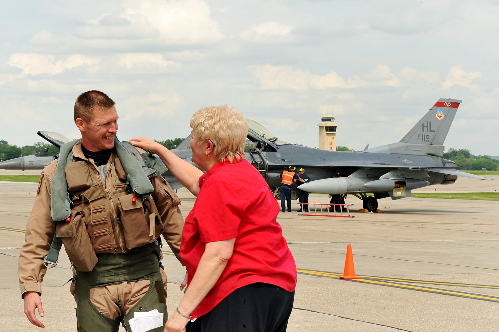 OFFUTT AIR FORCE BASE, Neb. -- Lt. Col. Bradley Frazier, 388th Fighter Wing from Hill AFB, Utah, receives a hug from his mother Nancy Frazier here May 26, after returning from a recent deployment to Afghanistan. U.S. Air Force Photo by Charles Haymond