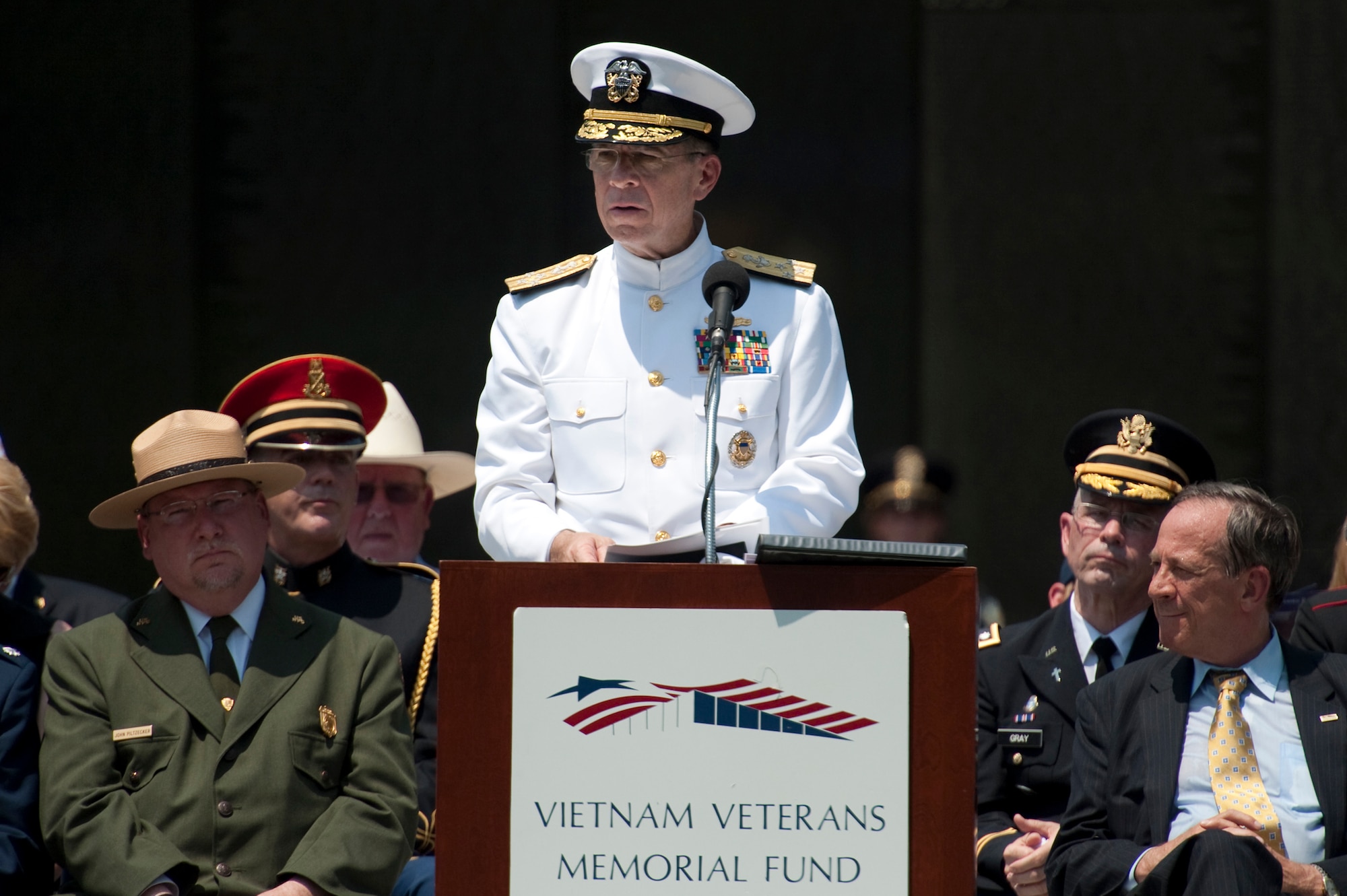 Adm. Mike Mullen, chairman of the Joint Chiefs of Staff, addresses audience members at the annual Memorial Day Observance Ceremony May 31, 2010, at the Vietnam Veterans Memorial in Washington, D.C.  Admiral Mullen gave the keynote address and recognized the addition of six new names to the more than 58,000 service members who perished in that war. (Defense Department photo/Petty Officer 1st Class Chad J. McNeeley)