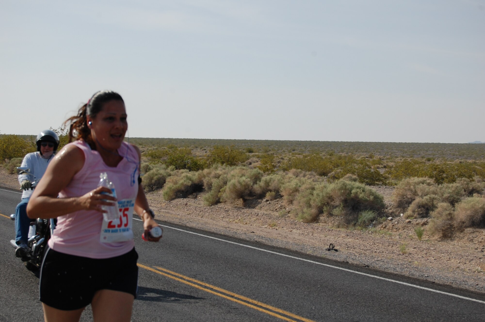 Josie Fonseca, captain of team LAAFB, runs the team's first leg of the 26th Annual "Baker to Vegas" Challenge Cup Relay Race April 17 and 18, 2010. (Courtesy photo)