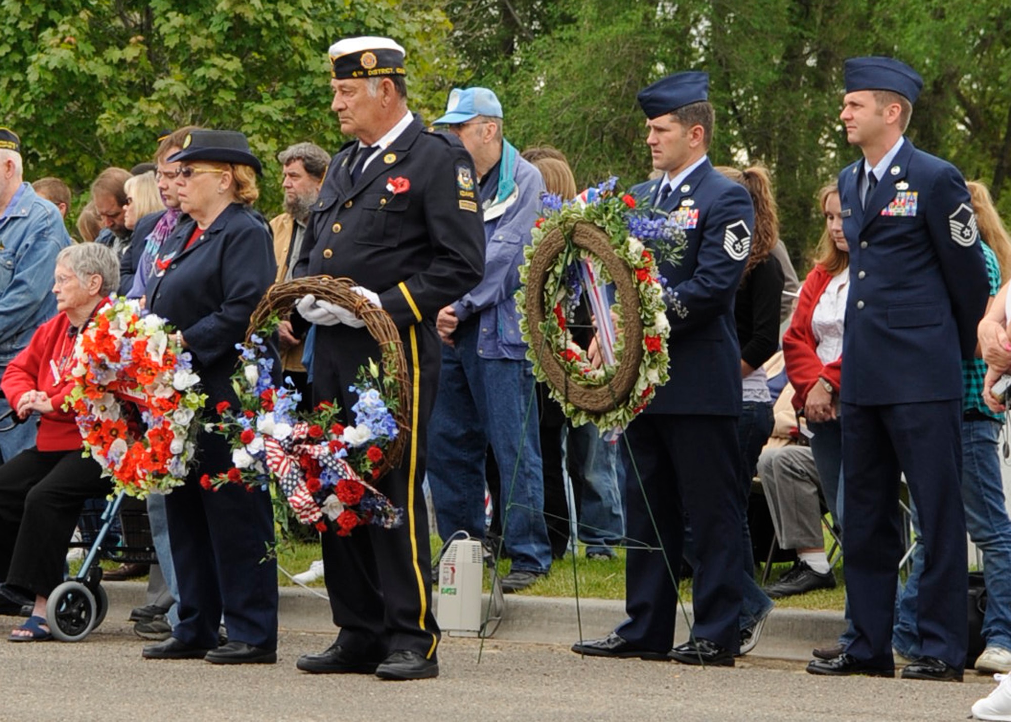 MOUNTAIN HOME AIR FORCE BASE, Idaho –Awaiting their moment, members of Mountain Home’s American Legion Post 26 and Gunfighters stand ready to present the wreaths for the fallen, during a Memorial Day ceremony at Mountain View Cemetery in Mountain Home, May 31. People worldwide paid their respects to those who have died in service of their country honoring their heroism, courage and ultimate sacrifice.  (U.S. Air Force photo by Airman 1st Class Angelina Drake)