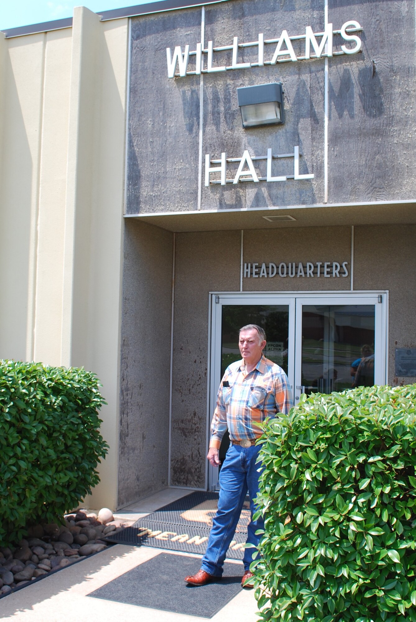 Following a tour of Williams Hall at Sheppard Air Force Base, Texas, May 30, 2010, Verlin Williams, brother of the training building’s namesake former Senior Master Sgt. William E. Williams, exits the building to rejoin his family.  Sergeant Williams was a site development and construction inspector instructor and career development course writer who contributed significantly to the 3770th Technical Training Group’s, the previous name of the 366th TRS, training mission before he passed away in 1982.  Williams Hall is the training building for the 366th TRS Operations Management, Electrical Power Production and Systems and Heating, Ventilating and Air Conditioning school houses.  (U.S. Air Force Photo/Tech. Sgt. Vernon Cunningham)
