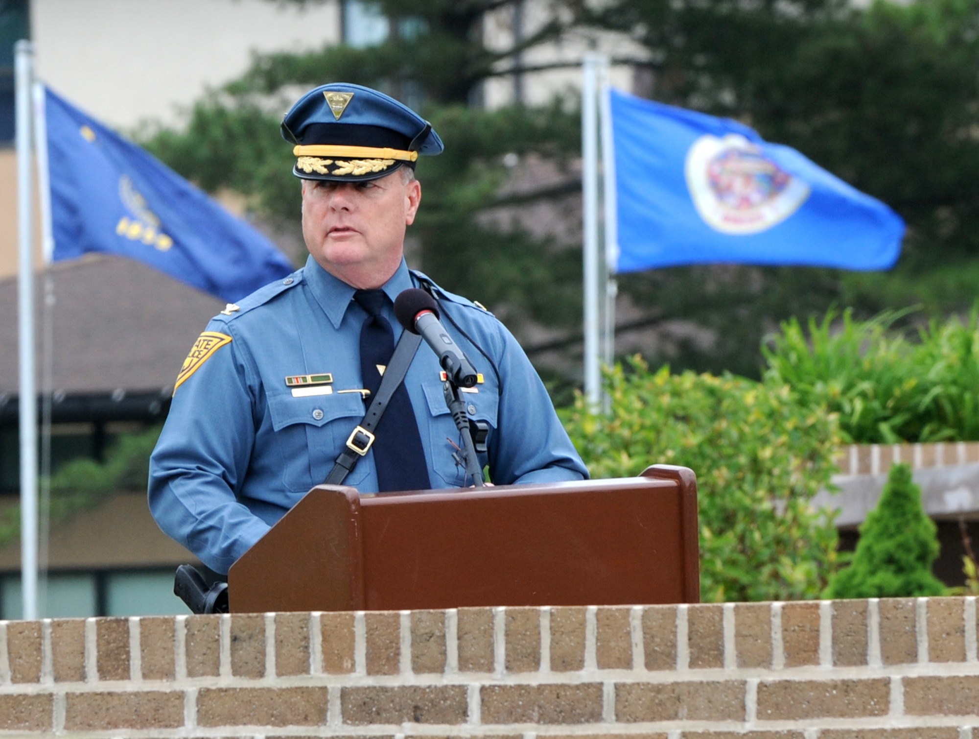 The New Jersey State Police superintendent, Col. Joseph R. Fuentes, speaks to the audience at the annual Parade of Wreaths ceremony May 27 here. Fuentes asked the audience to not only remember those who gave the ultimate sacrifice but also remember those who protect America stateside and overseas.  Fuentes was one of two guest speakers for the ceremony. (U.S. Air Force photo/Wayne Russell)
