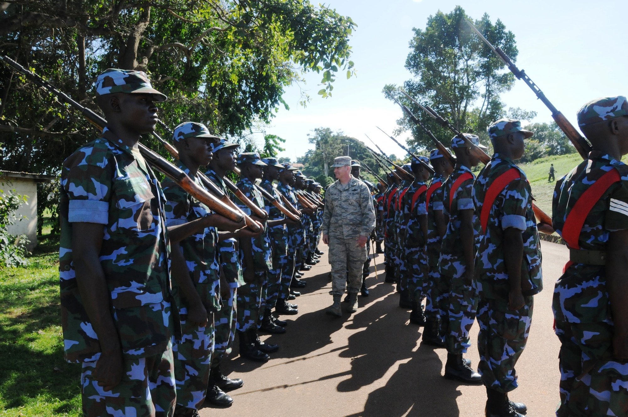 Brig. Gen. Michael Callan, 17th Air Force Vice Commander, reviews a
formation of the Ugandan People's Defense Force s in Entebbe, Uganda May 25.
(U.S. Air Force photo by Maj. Paula Kurtz)
