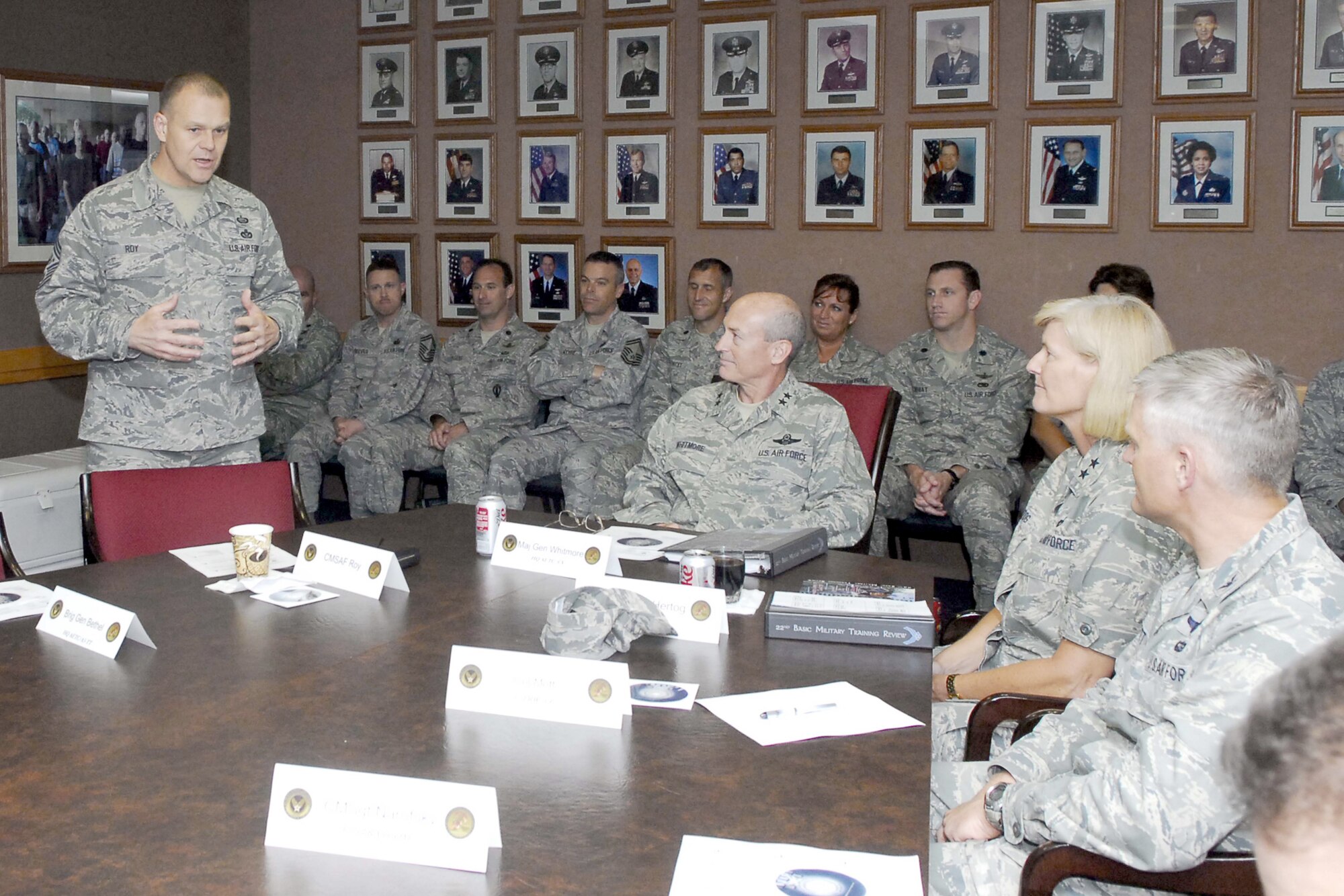 From left, Chief Roy delivers the committee’s outbrief and recommendations to General Whitmore, General Hertog, Colonel Mott and and other training leaders.  (U.S. Air Force photo by Alan Boedeke)