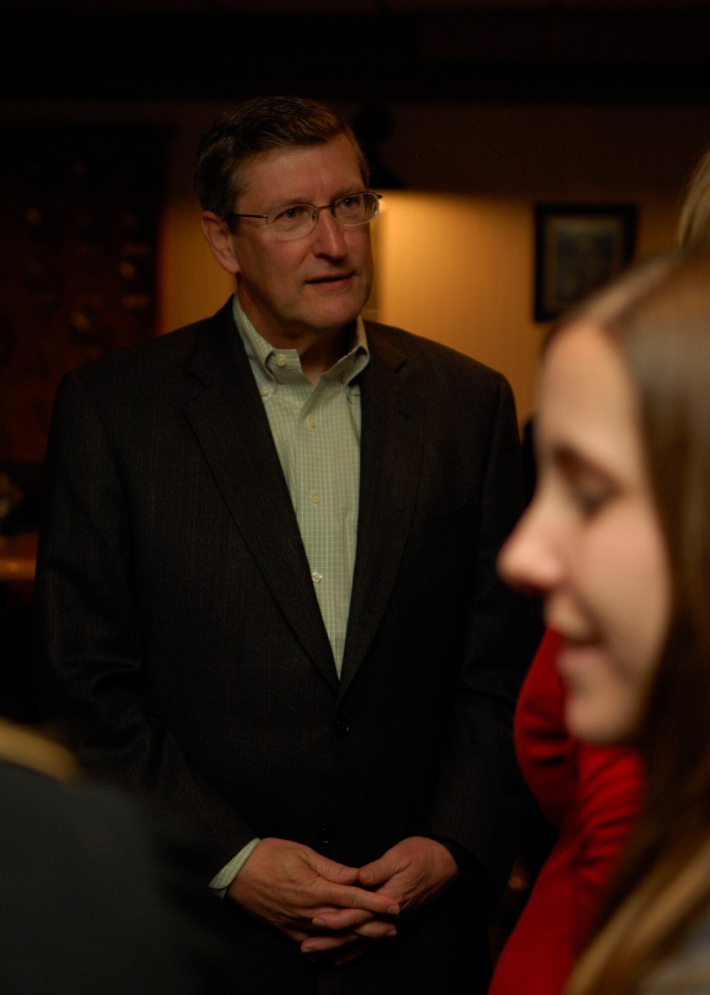 MINOT AIR FORCE BASE, N.D. -- Senator Kent Conrad, North Dakota Senator, mingles with the spouses of deployed Airmen at the Jimmy Doolittle Center here June 1. The spouses spoke with the senator about what it is like to be a military spouse. (U.S. Air Force photo by Senior Airman Ashley N. Avecilla)
