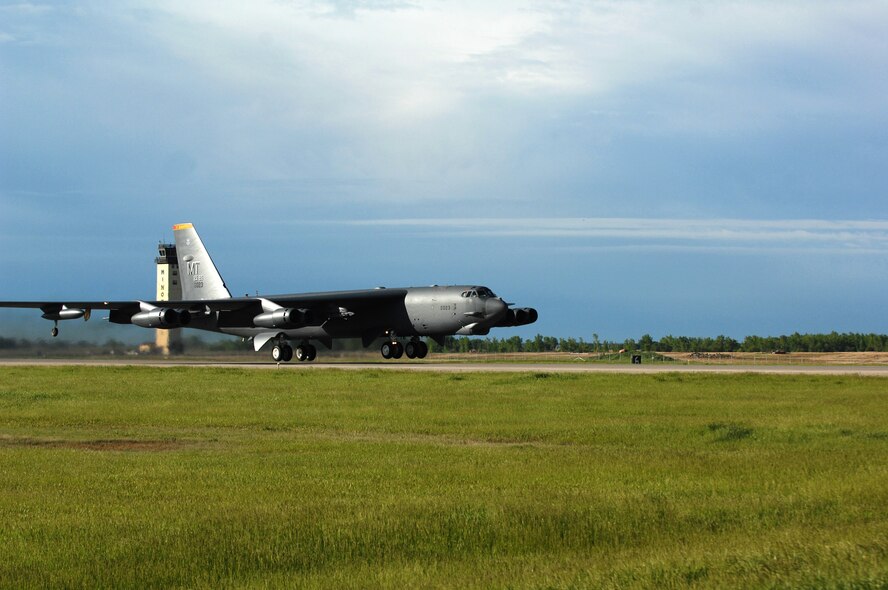 MINOT AIR FORCE BASE, N.D. -- A B-52H Stratofortess takes off on its way to Andersen AFB, Guam, as part of a deployment here Jun 1. During the six-month deployment, nearly 350 Airmen and several B-52s will provide U.S. Pacific Command with a continuous bomber presence in the Asia-Pacific region. (U.S. Air Force photo by Senior Airman Michael J. Veloz)