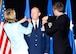 Brigadier General Kevin Jacobsen (center) has his stars pinned on by his wife Karen (left) and son Steven (right). (U.S. Air Force photo/Mike Hastings)