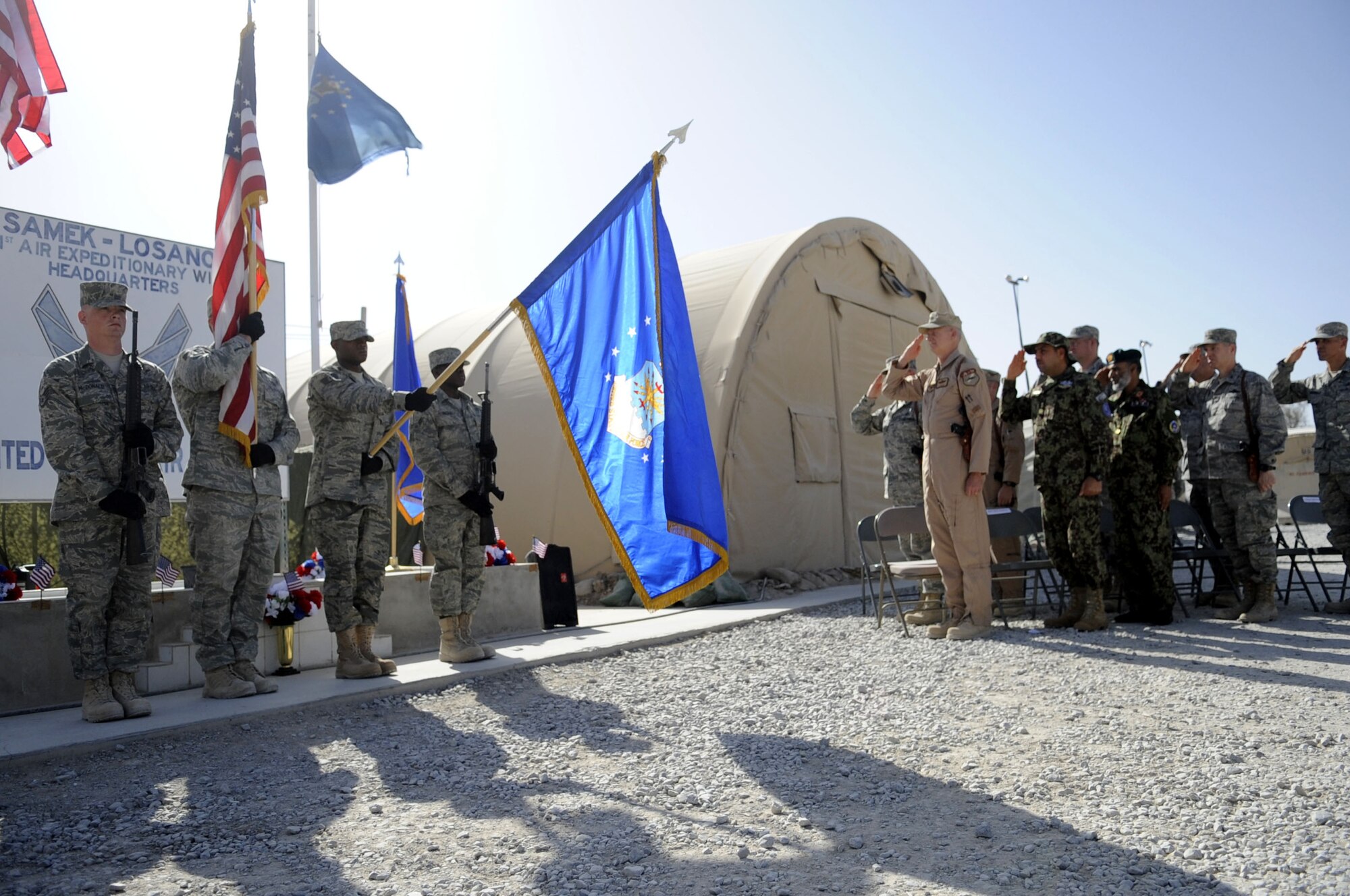 Members of the U.S. Air Force and Afghan Kandahar Air Wing recognizing America's fallen warriors on Memorial Day, May 31st, 2010.  (U.S. military photo/RELEASED)
