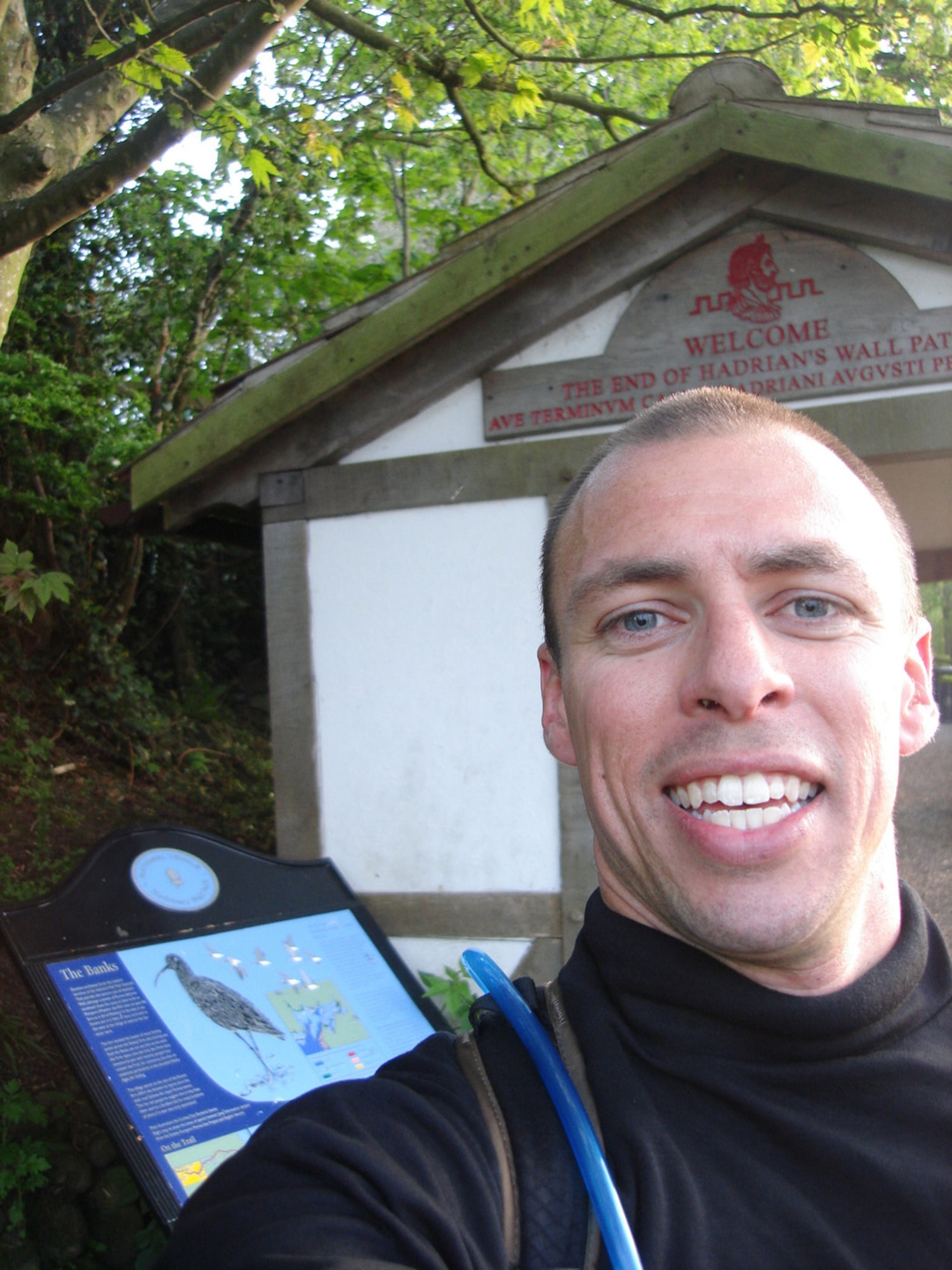 Capt. Danny Franz, 67th Special Operations Squadron, poses for a self-portrait at the end of Hadrian's Wall Path, after he ran it May 14. Hadrian's Wall itself is 73 miles long, but the path stretches for 84 miles. Captain Franz ran Hadrian's Wall Path in 19 hours and 24 minutes, beating the unofficial record of just over 23 hours. It runs along a riverside route in Tyneside, through farmland in Tynedale, Northumberland, and gradually descends to the pastures of Cumbria, before finally ending at the salt marshes of the Solway Estuary. (Courtesy photo)                           