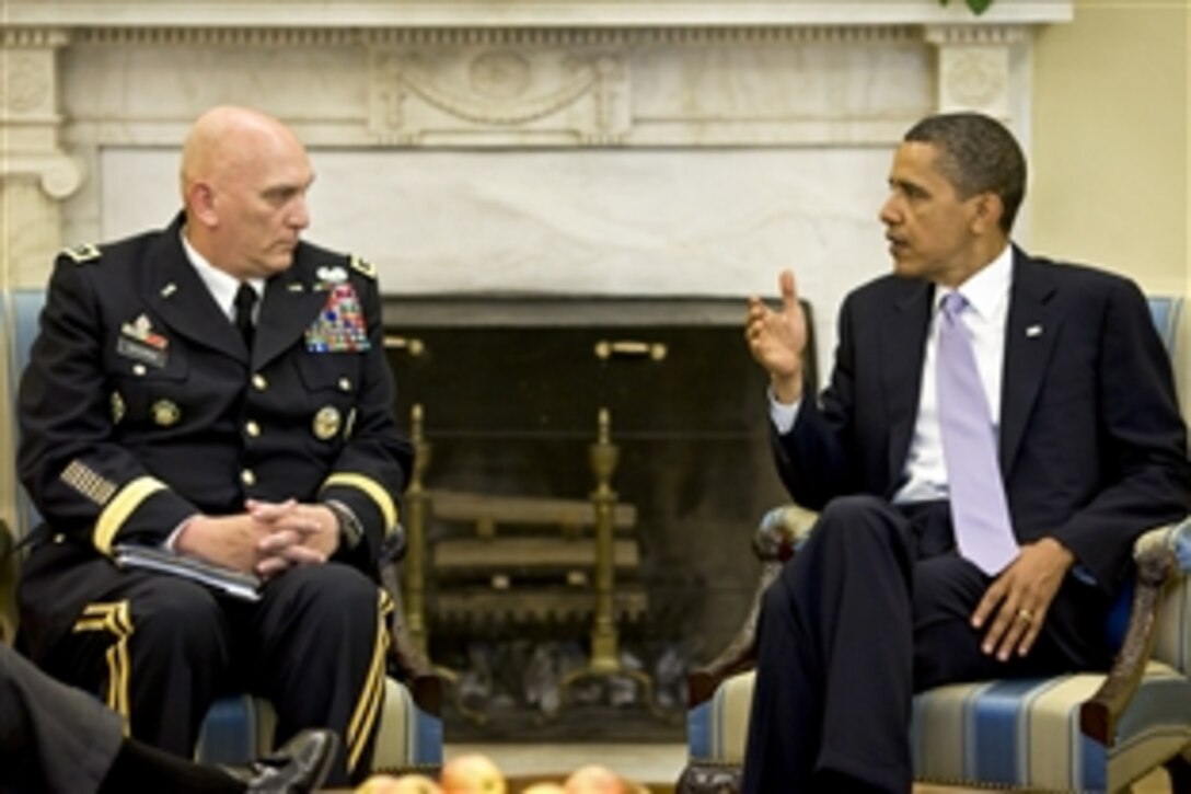 President Barack Obama meets with U.S. Army Gen. Raymond T. Odierno, commander, U.S. Forces Iraq, in the Oval Office, June 2, 2010.