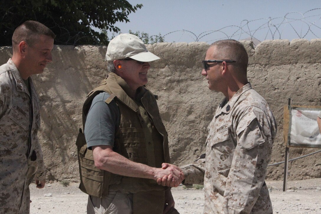 Secretary of the Navy, The Honorable Mr. Ray Mabus (center), shakes hands with Sgt.Maj. Jeffrey Cullen (right), 1st Battalion 2nd Marine Regiment (1/2) Sergeant Major, before departing Musa Qal'eh District Center, Afghanistan, June 3, 2010.  Marines with 1/2 were deployed in support of the International Security Assistance Force.  (U.S. Marine Corps photo by Sgt. Sean Baldwin)