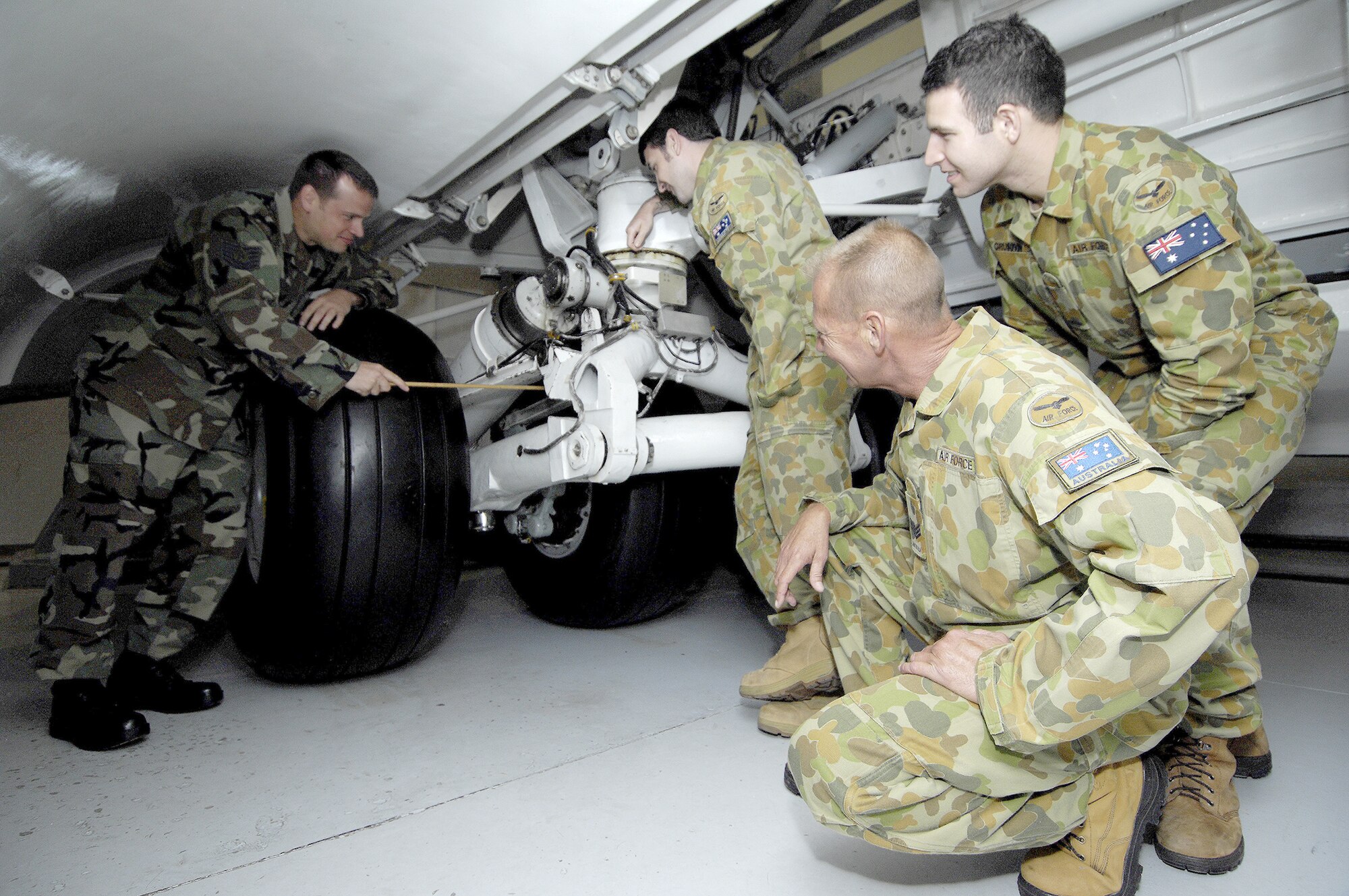 Tech. Sgt. Bryan Doughty instructs Royal Australian Air Force members during a three-month course on C-17 Globemaster III maintenance June 1, 2010, at Joint Base Charleston, S.C. Sergeant Doughty is a training instructor with the 373rd Training Squadron, Det. 5. (U.S. Air Force photo/Airman 1st Class Lauren Main)