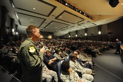 U.S. Air Force Lt. Col. John Donahue asks a question to U.S. Navy Adm. Mike Mullen at the base theater on Joint Base Charleston, S.C., June 3, 2010. During his visit, Admiral Mullen fielded questions from Airmen and addressed Department of Defense policy changes and expectations during an all hands call. Admiral Mullen is the Chairman of the Joint Chiefs of Staff, and Colonel Donahue is the chief of wing plans with the 437th Airlift Wing. (U.S. Air Force Photo/James M. Bowman)

